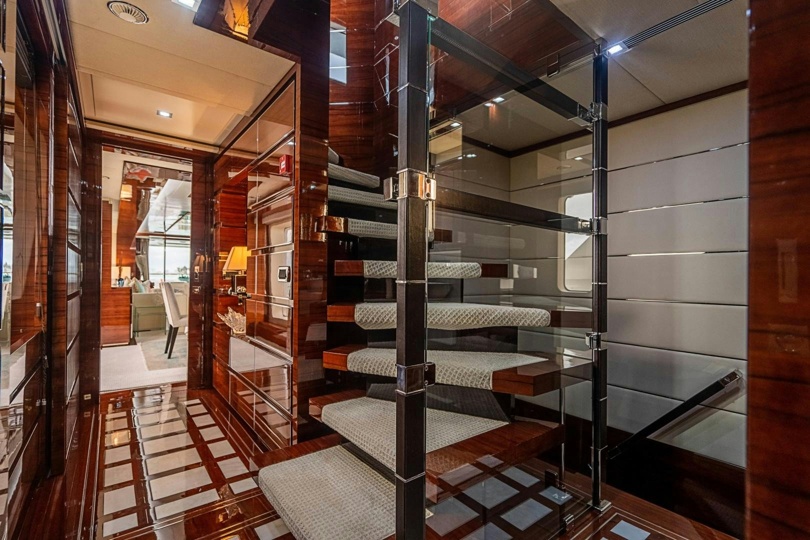 a room with a set of stairs aboard No Name Yacht for Sale