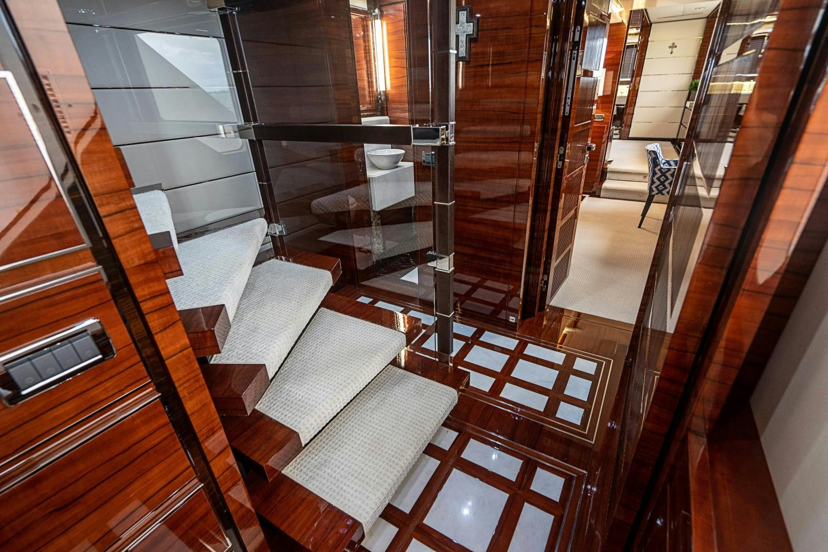 a room with a glass wall aboard No Name Yacht for Sale