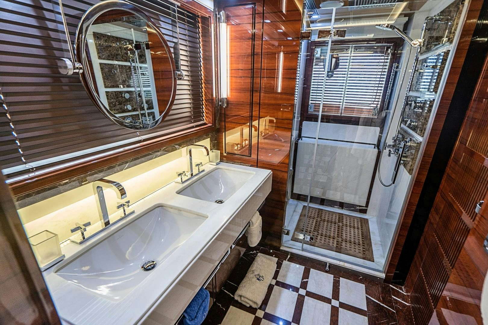 a bathroom with a sink and a mirror aboard No Name Yacht for Sale