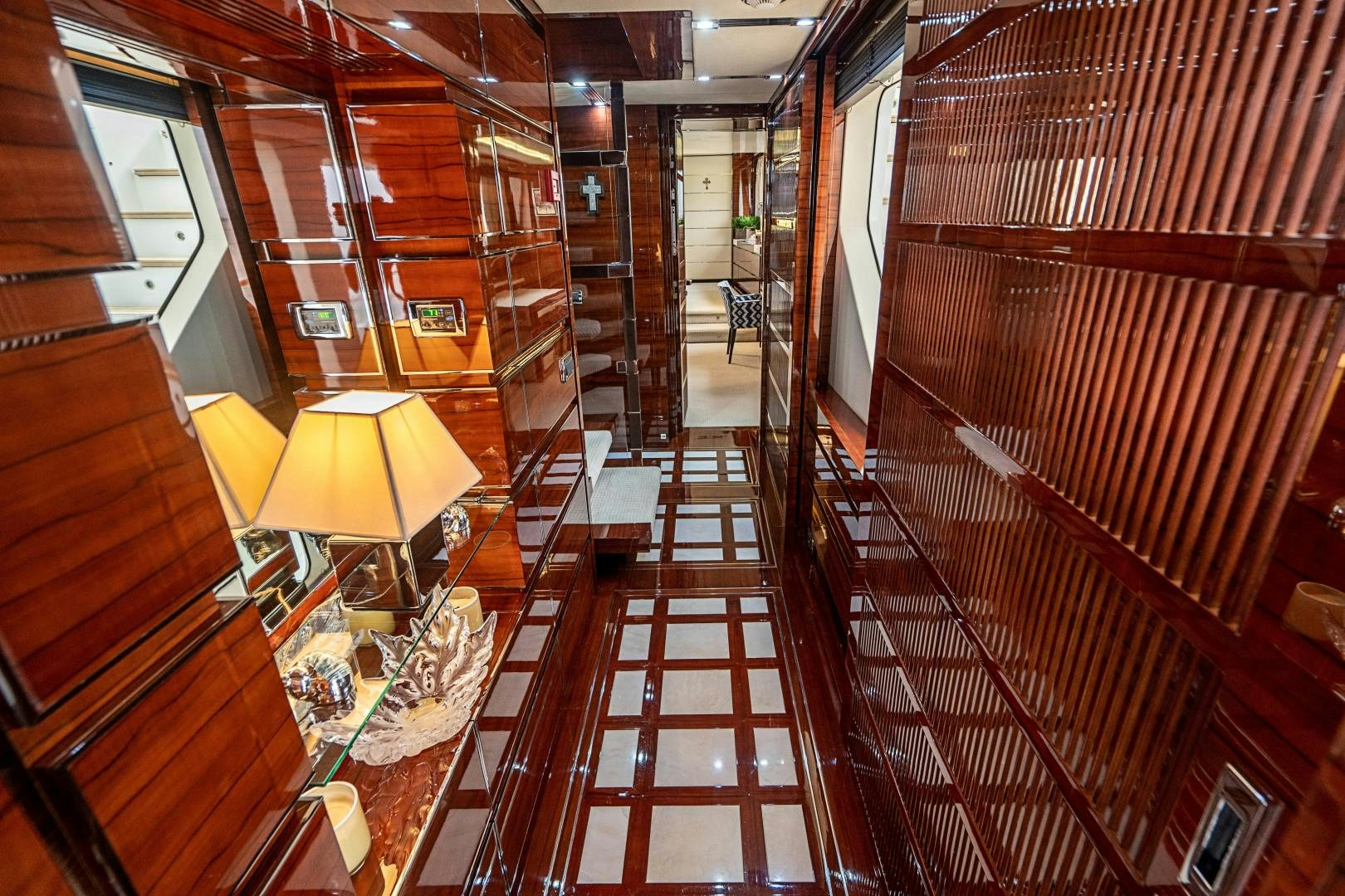 a hallway with wooden stairs aboard No Name Yacht for Sale