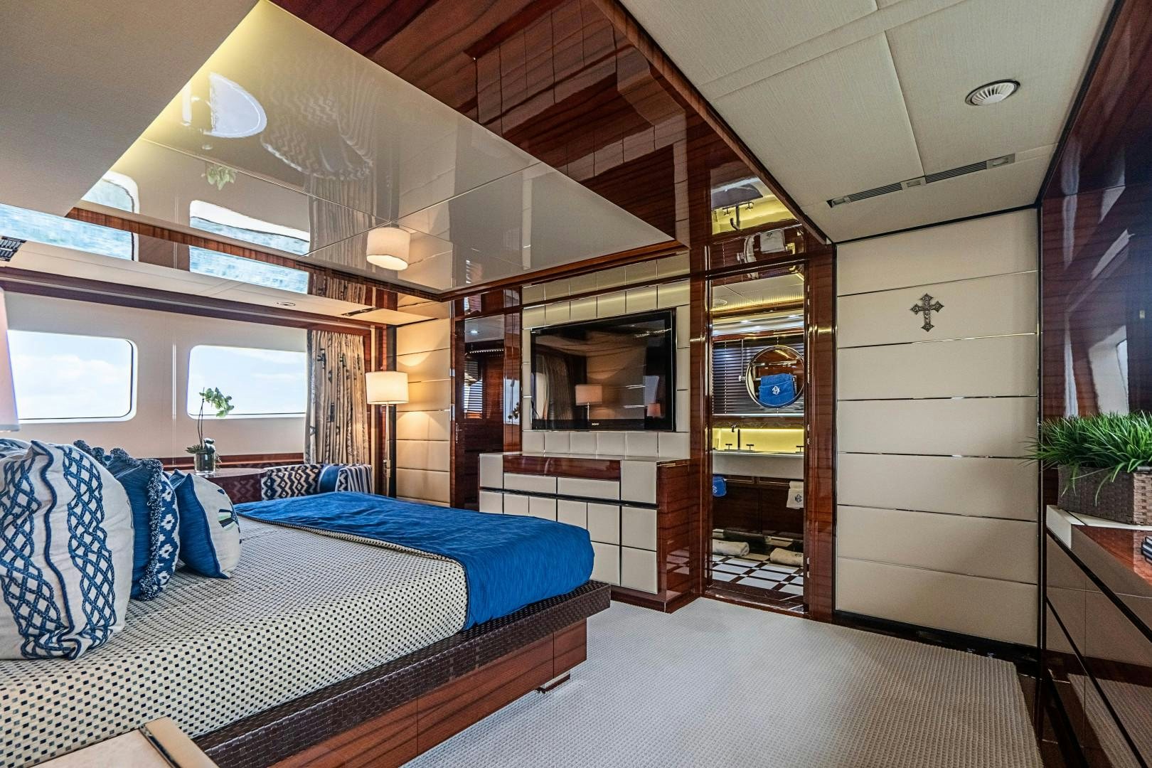 a bedroom with a large bed aboard No Name Yacht for Sale