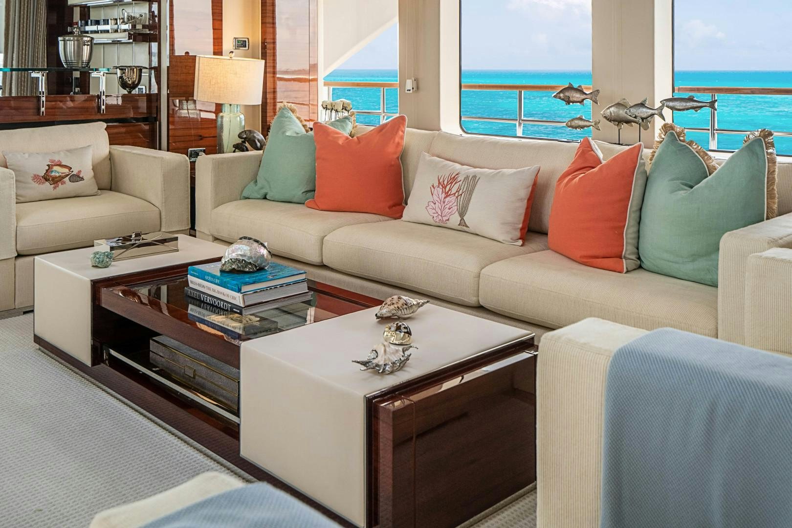 a living room with a large window aboard No Name Yacht for Sale