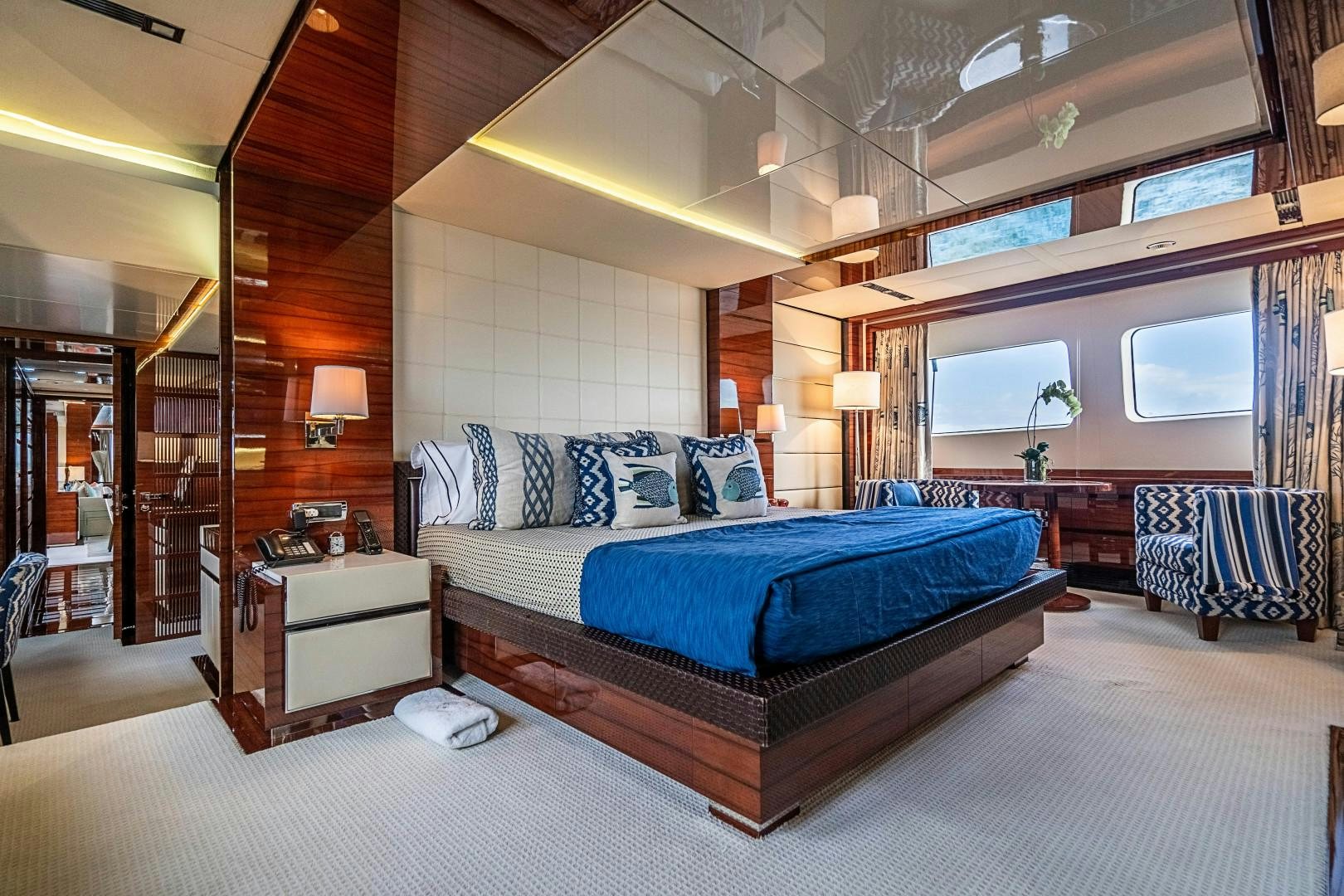 a large bedroom with a large bed aboard No Name Yacht for Sale