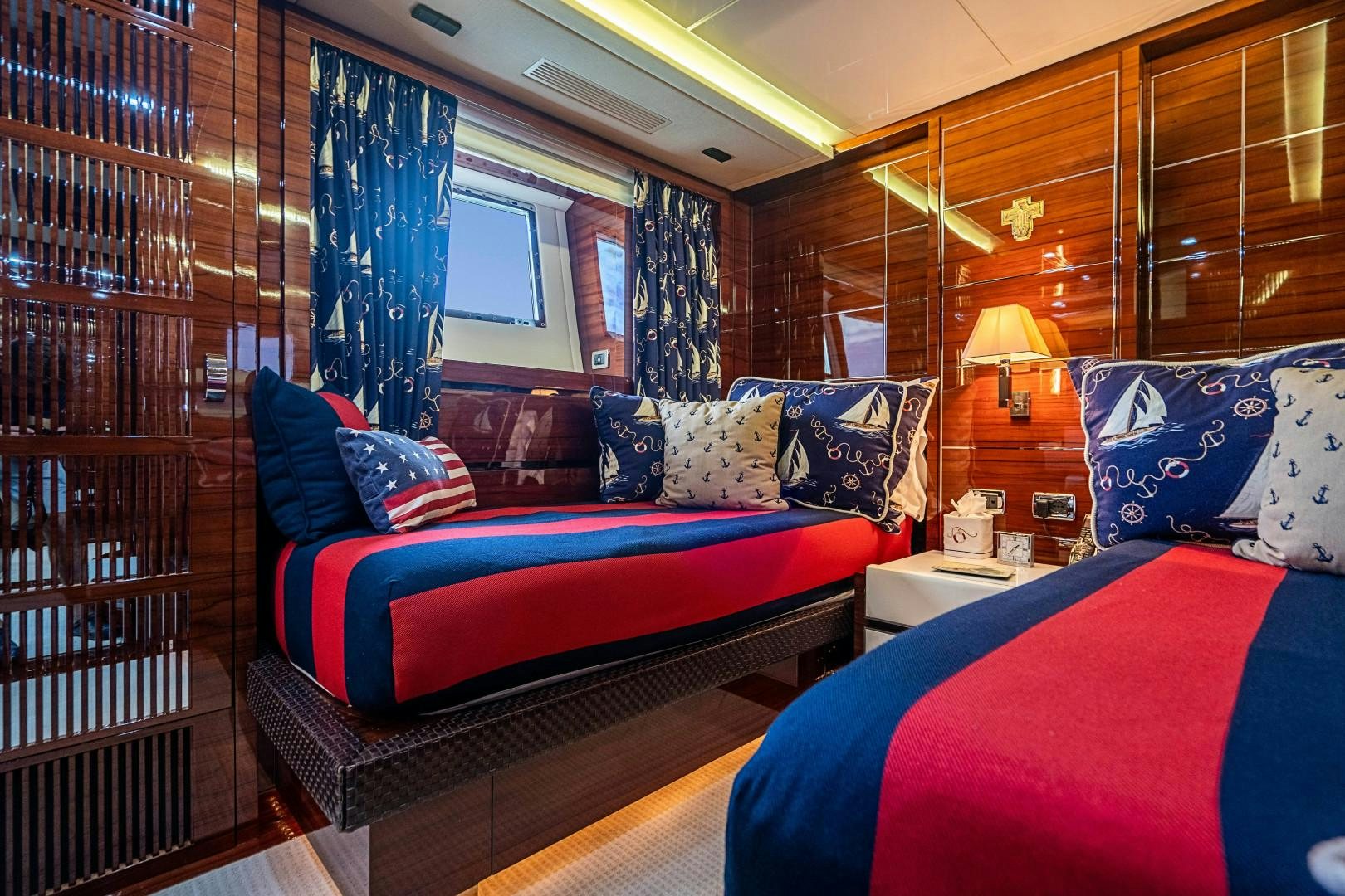 a bed in a room aboard No Name Yacht for Sale