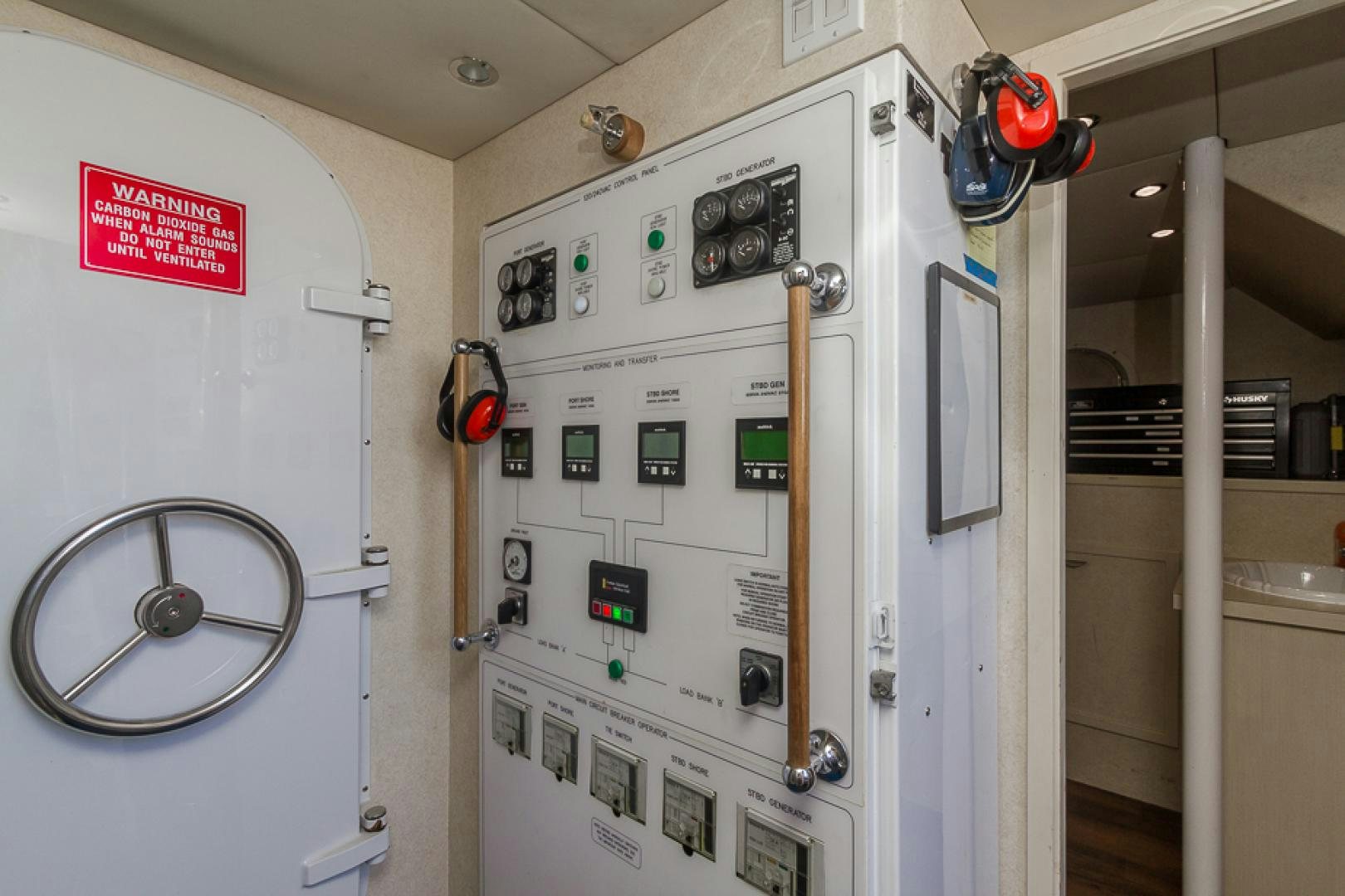 a wall with switches and switches aboard LIQUIDITY Yacht for Sale