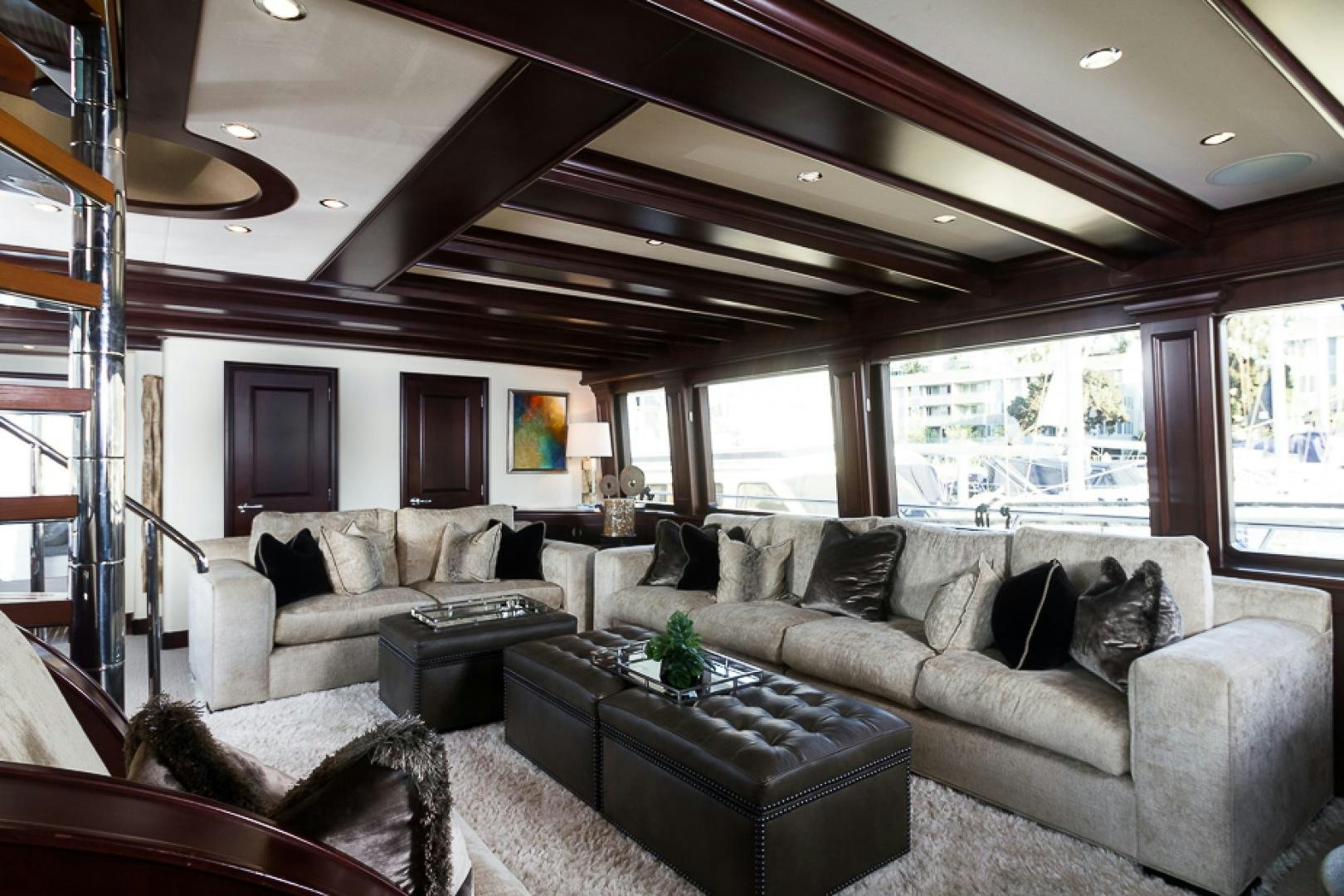 a living room with a large window aboard LIQUIDITY Yacht for Sale