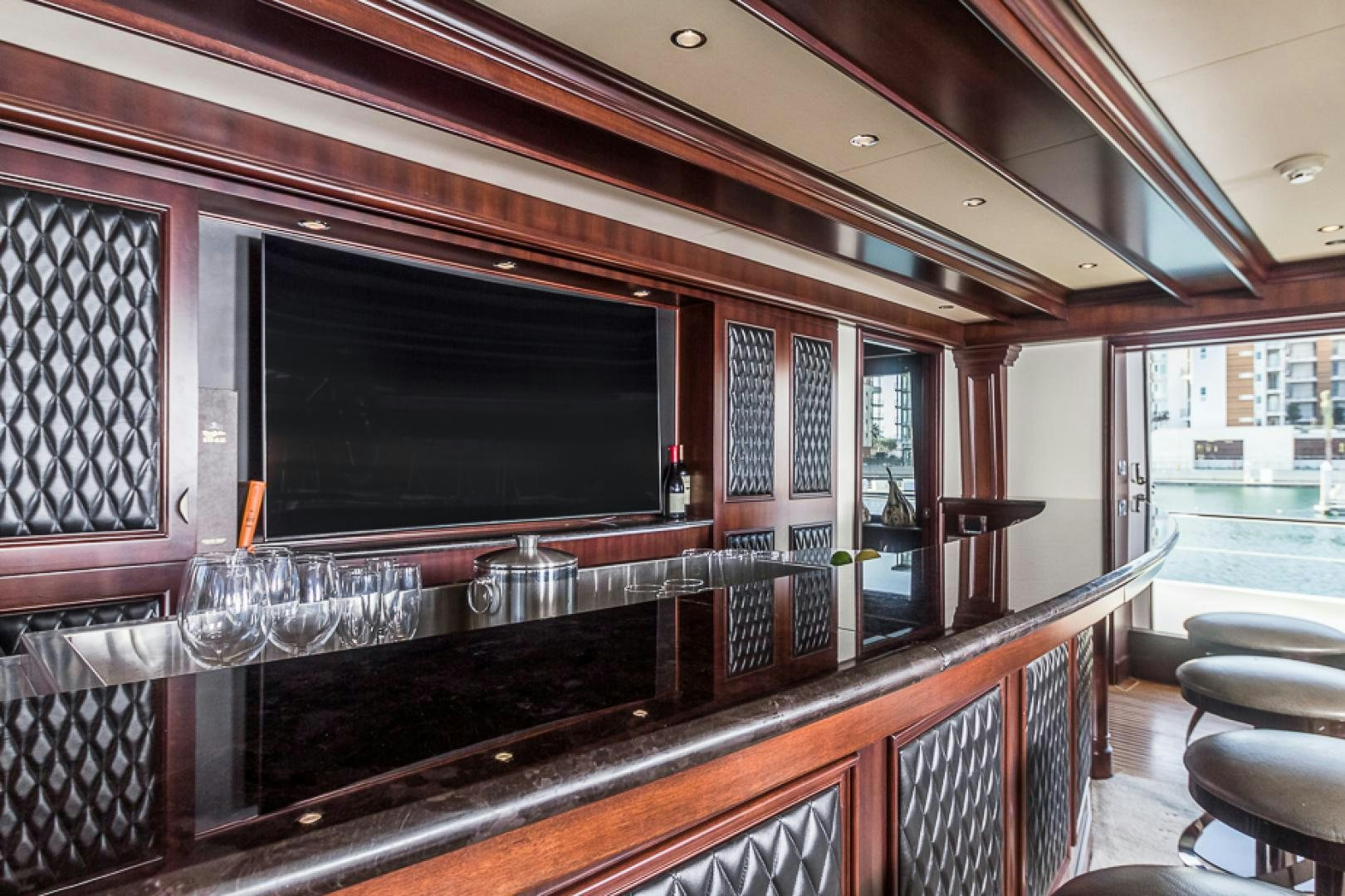 a kitchen with a large bar aboard LIQUIDITY Yacht for Sale