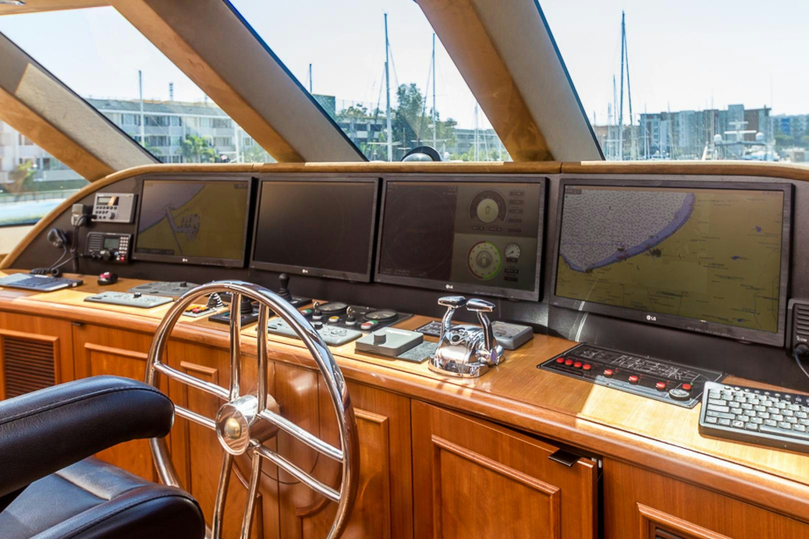 inside of a vehicle with a computer and monitor and keyboard aboard LIQUIDITY Yacht for Sale