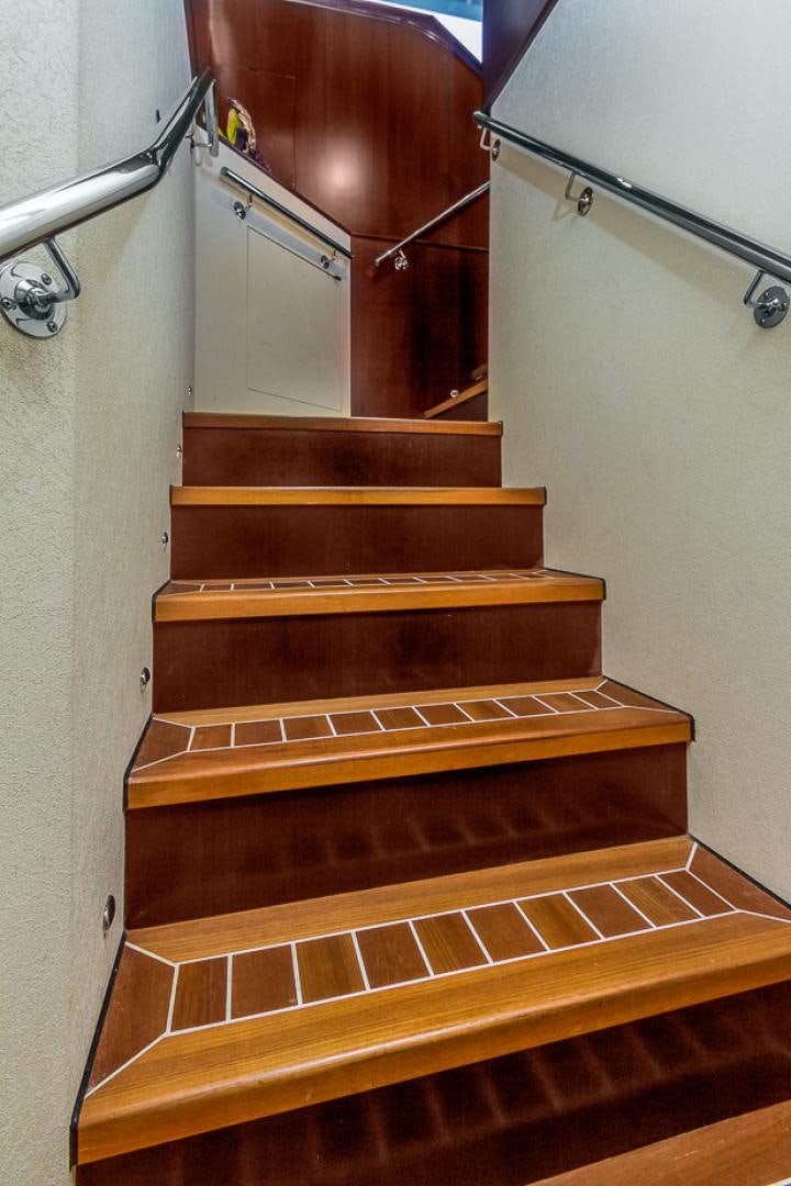a set of stairs in a room aboard LIQUIDITY Yacht for Sale
