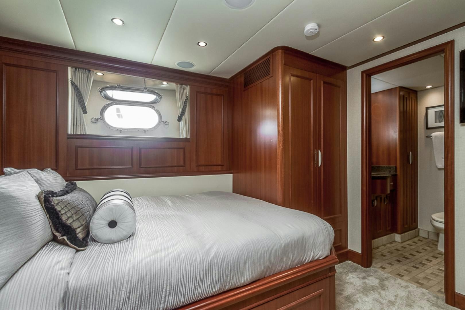 a bed in a room aboard LIQUIDITY Yacht for Sale