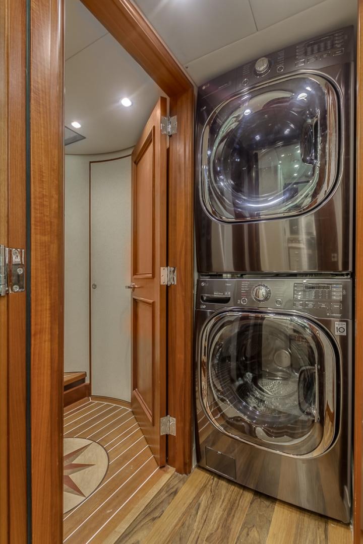 a large washing machine in a room aboard LIQUIDITY Yacht for Sale