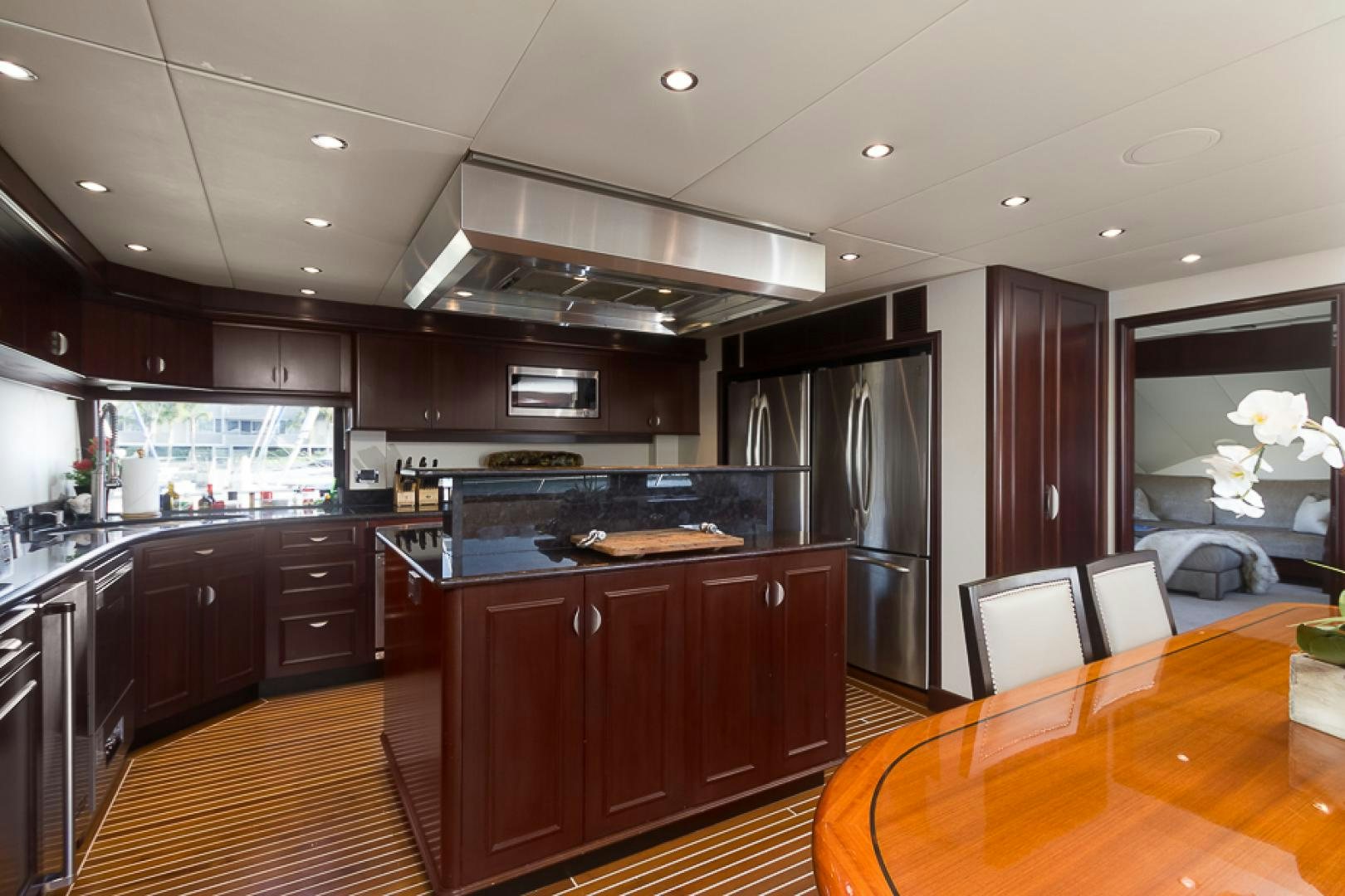 a kitchen with a large island aboard LIQUIDITY Yacht for Sale
