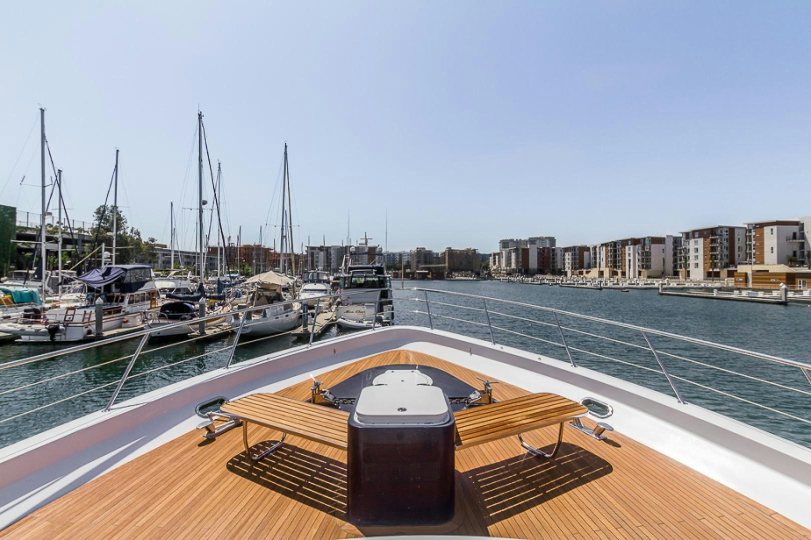 a boat docked at a pier aboard LIQUIDITY Yacht for Sale