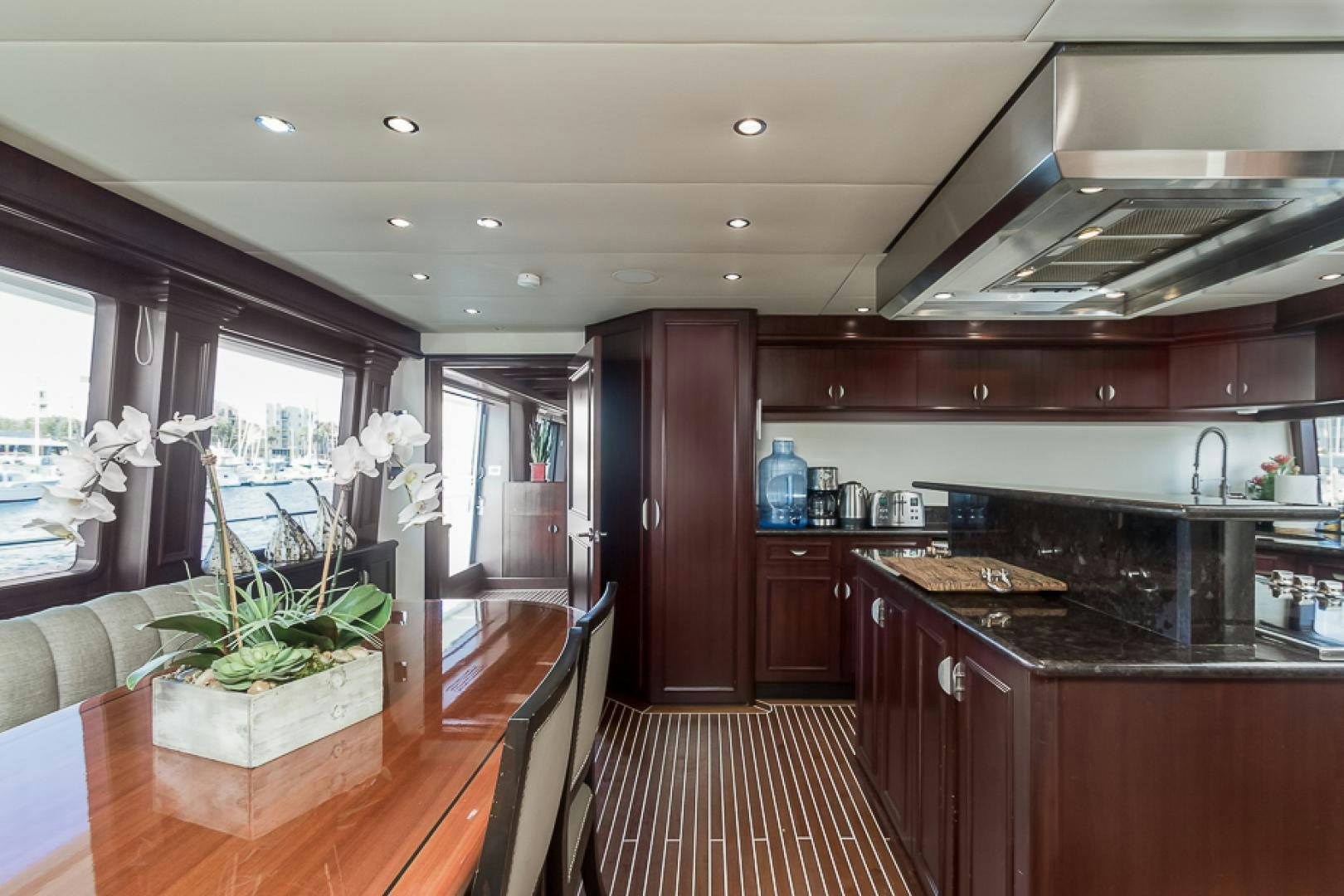a kitchen with a large island aboard LIQUIDITY Yacht for Sale