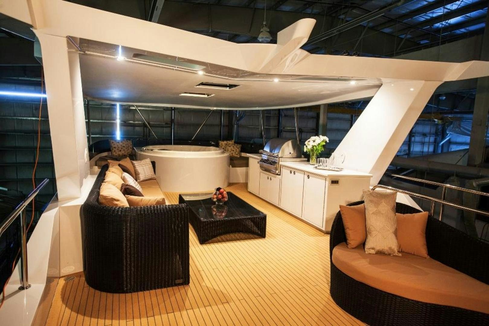 a room with a couch and a table aboard ENCORE Yacht for Sale