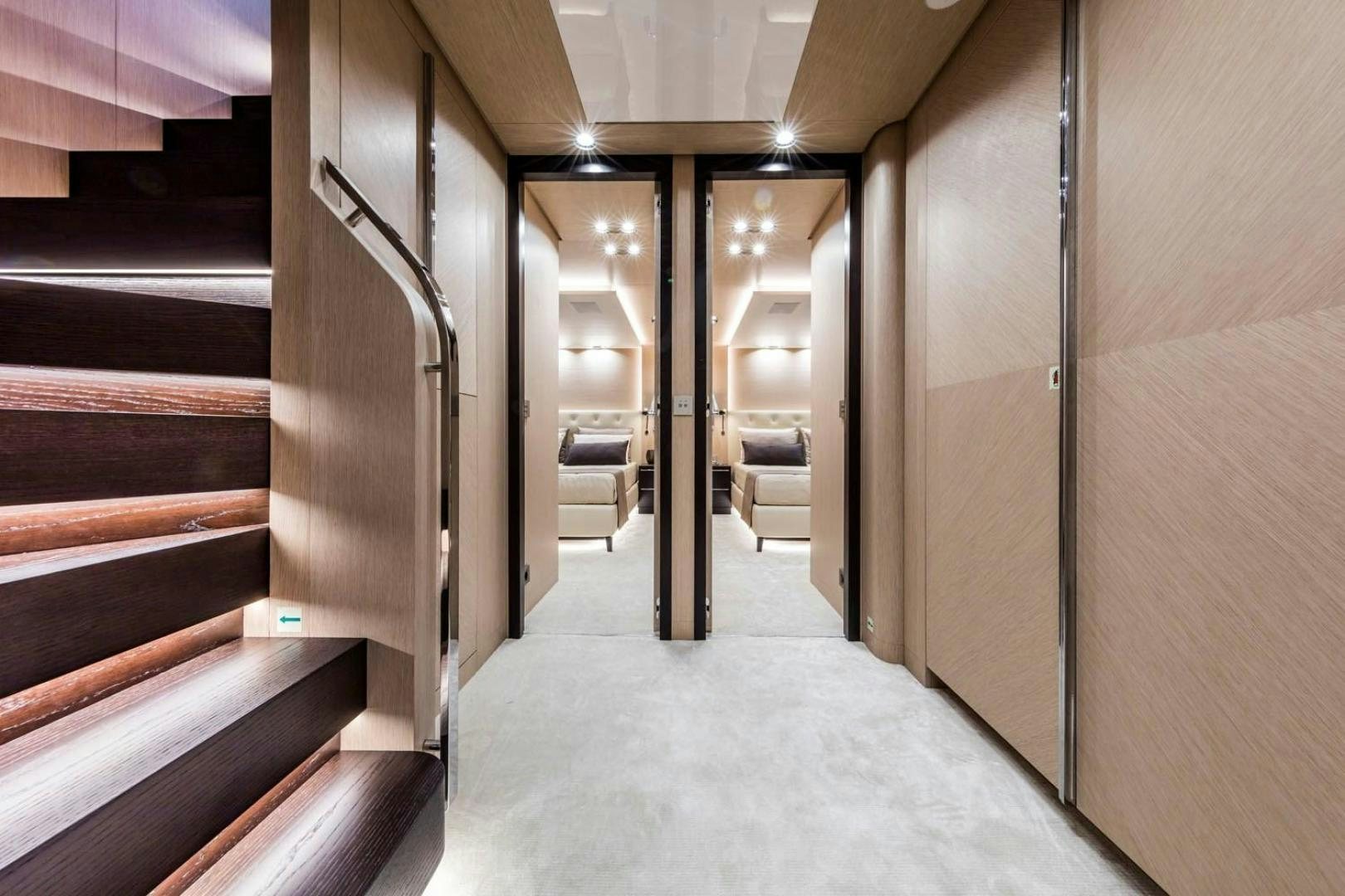 a hallway with a few doors aboard CLORINDA Yacht for Sale