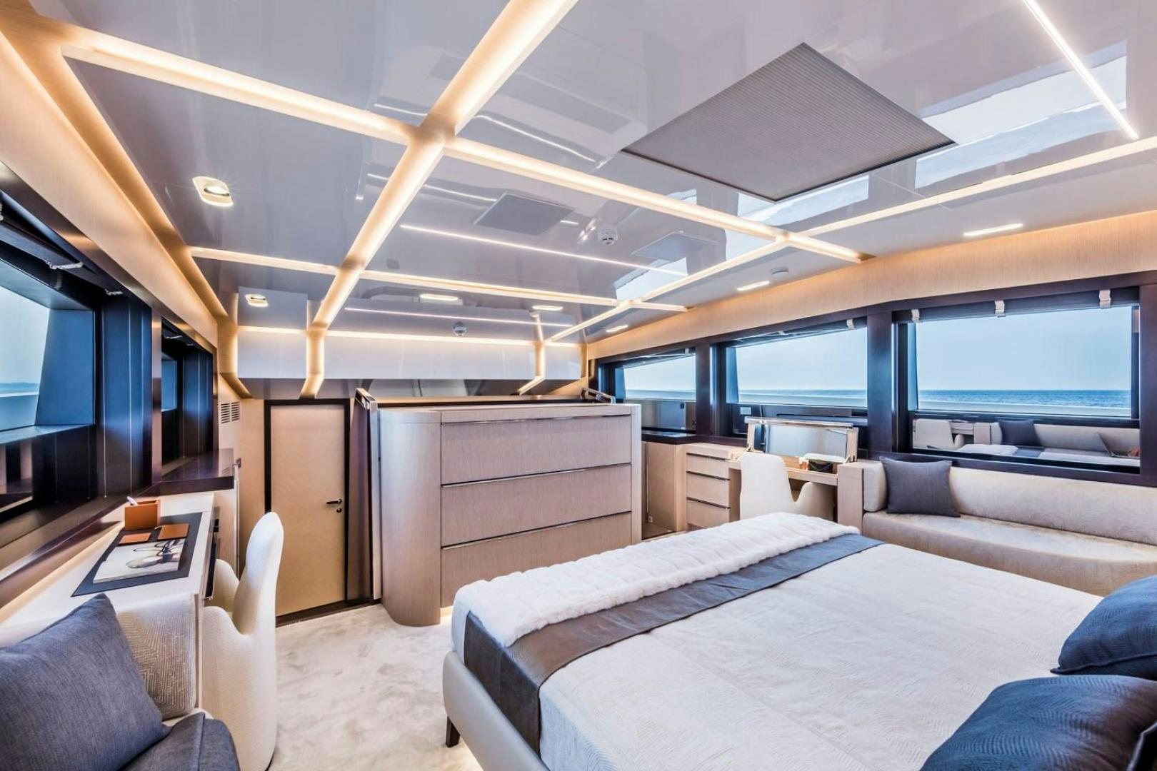 a room with a bed and a desk aboard CLORINDA Yacht for Sale