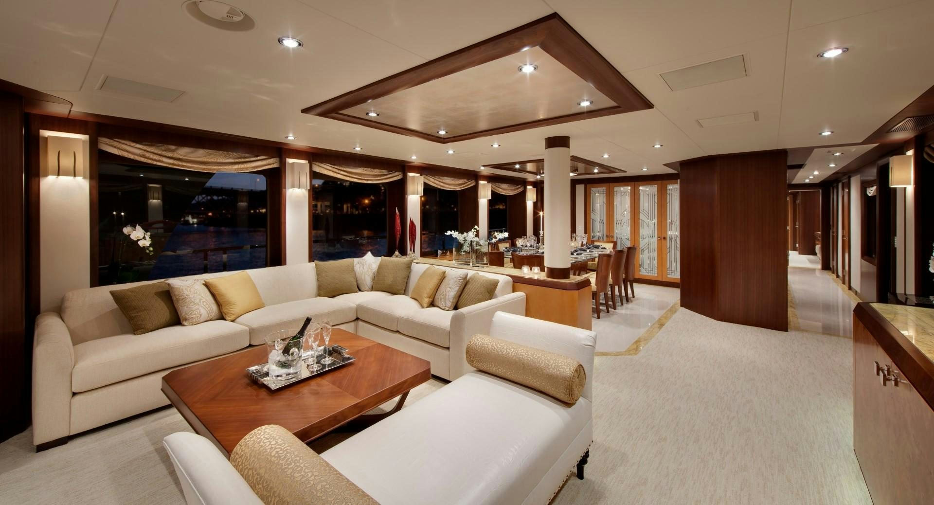 a living room with a large window aboard DREAM WEAVER Yacht for Sale