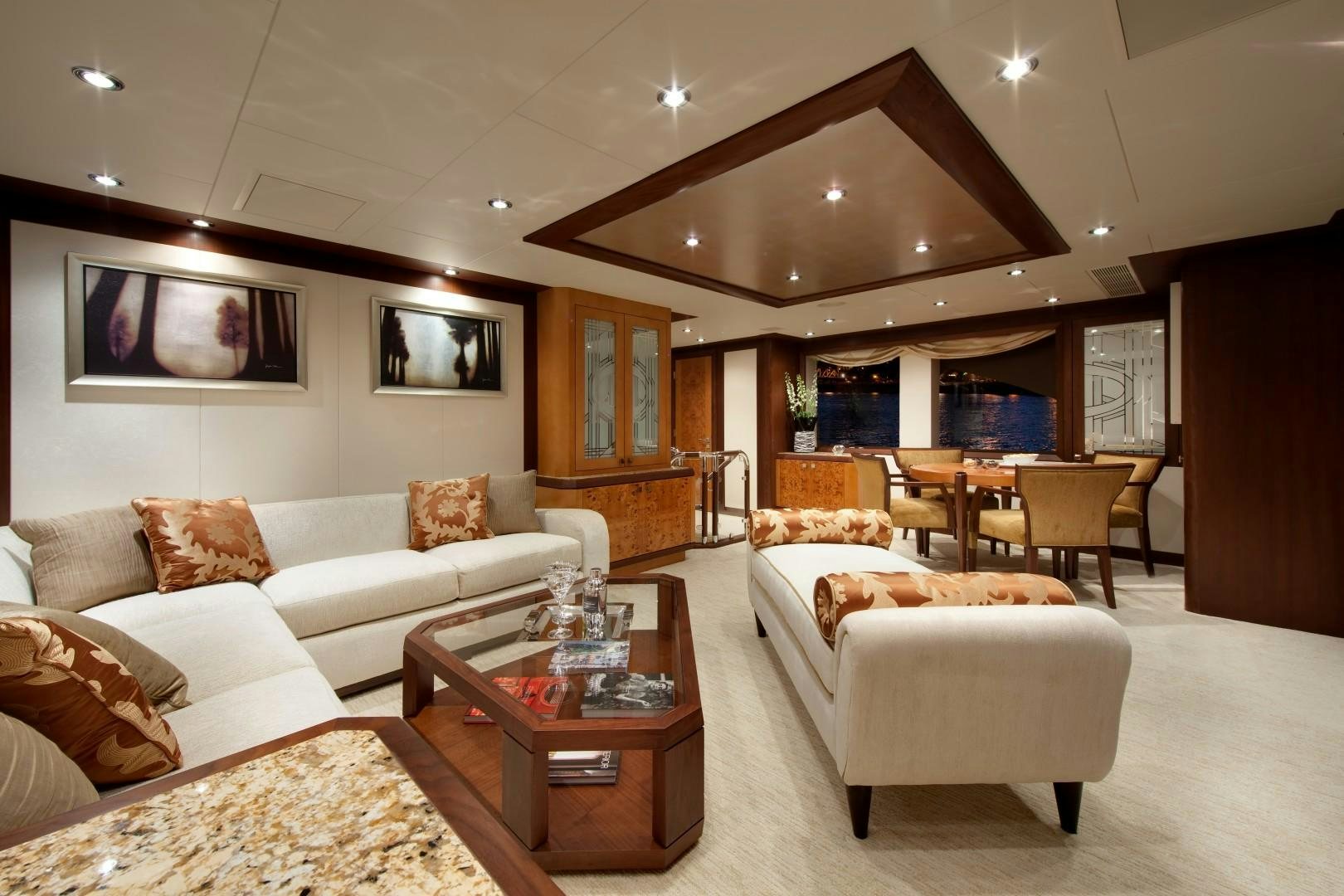 a living room with a couch and a table aboard DREAM WEAVER Yacht for Sale