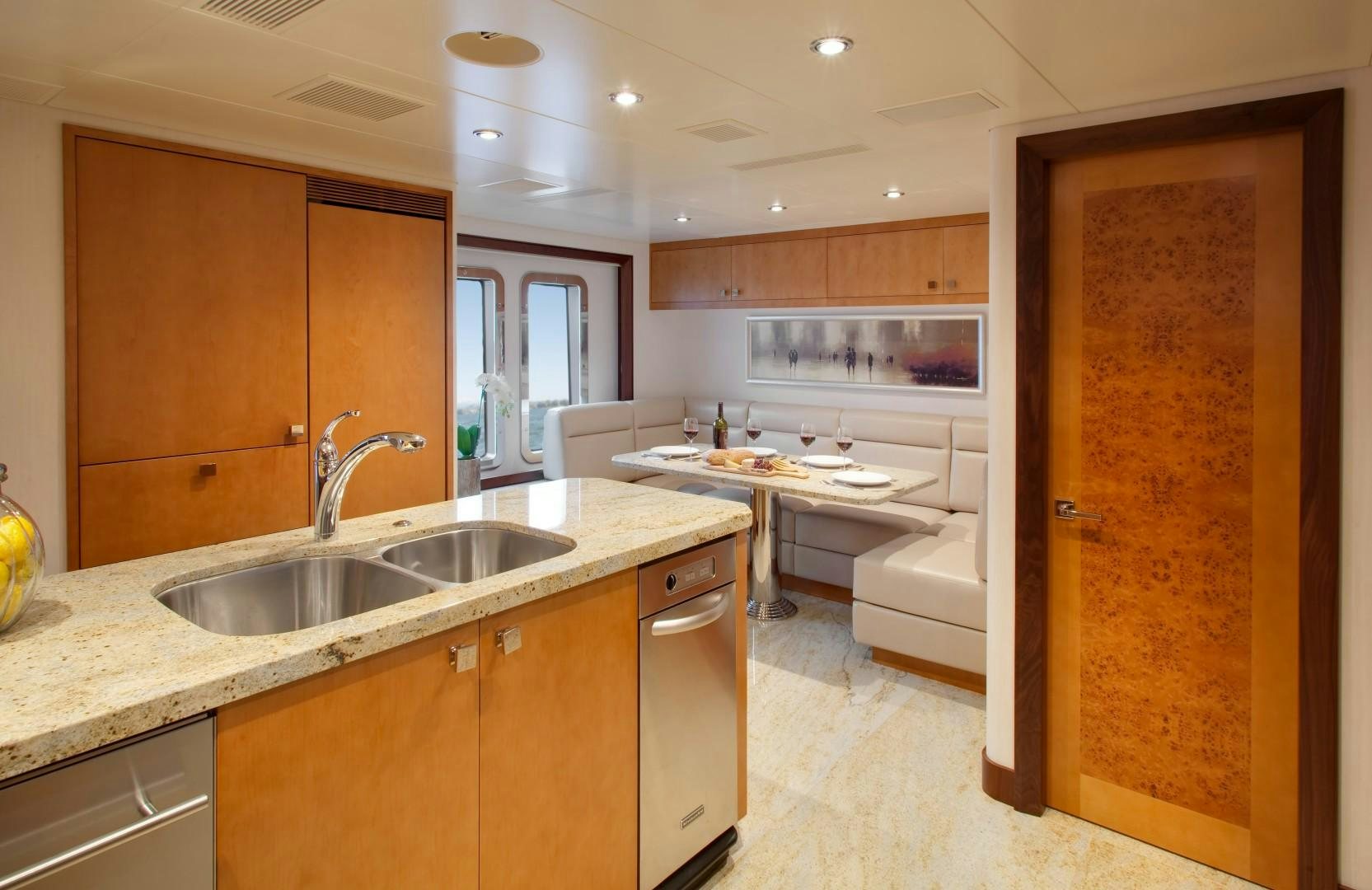 a kitchen with a sink and cabinets aboard DREAM WEAVER Yacht for Sale