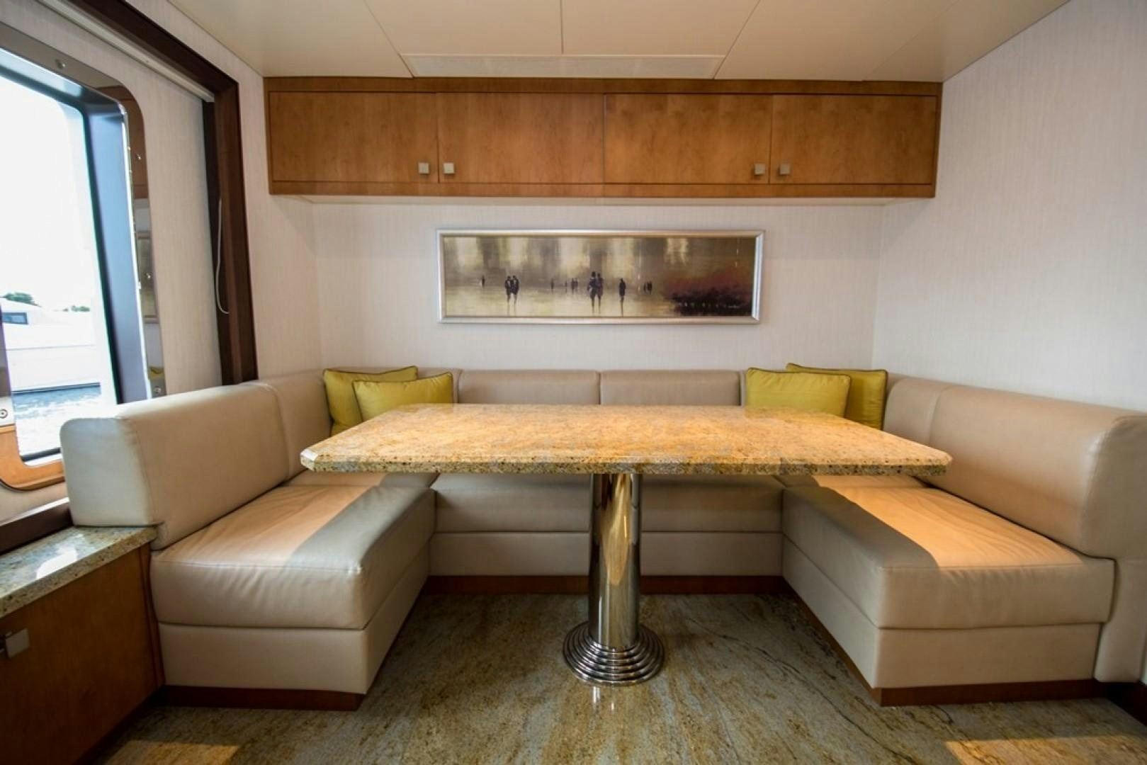 a living room with a couch and a table aboard DREAM WEAVER Yacht for Sale