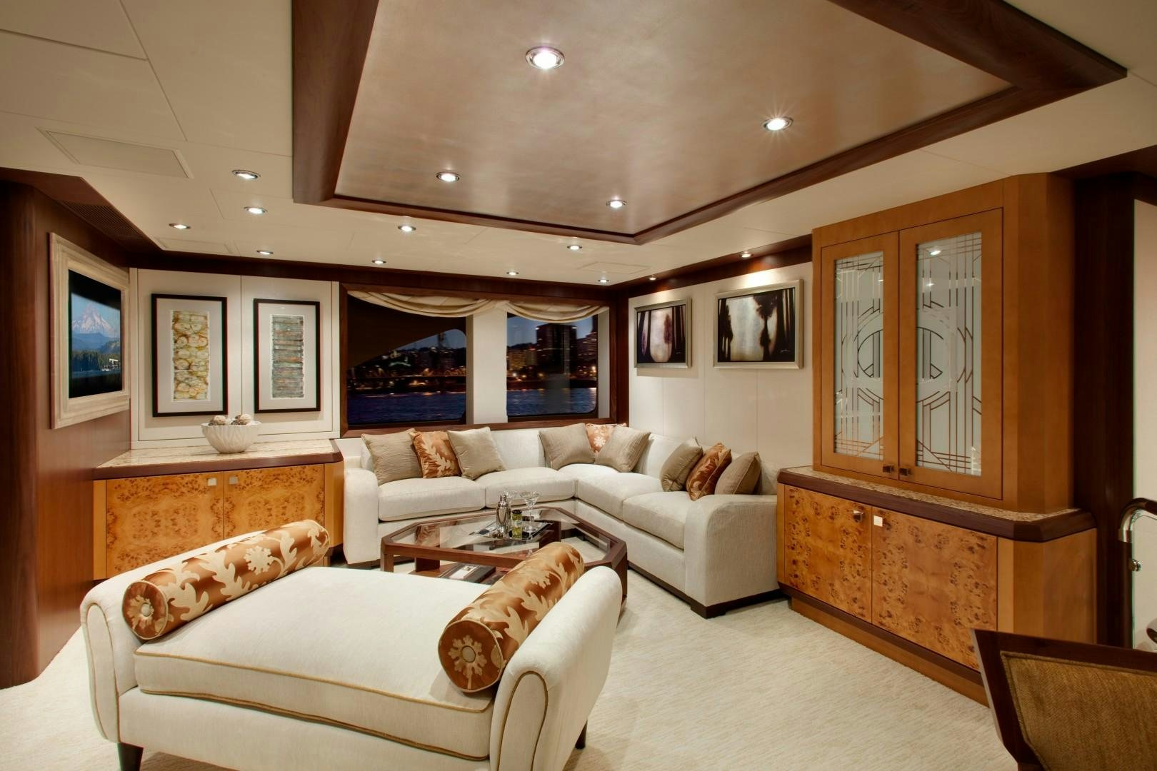 a living room with a fireplace aboard DREAM WEAVER Yacht for Sale