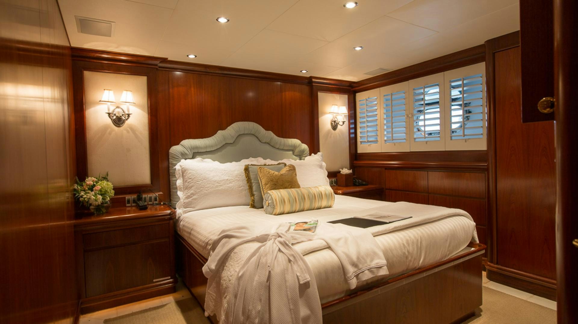 a bed in a room aboard OCEAN CLUB Yacht for Sale