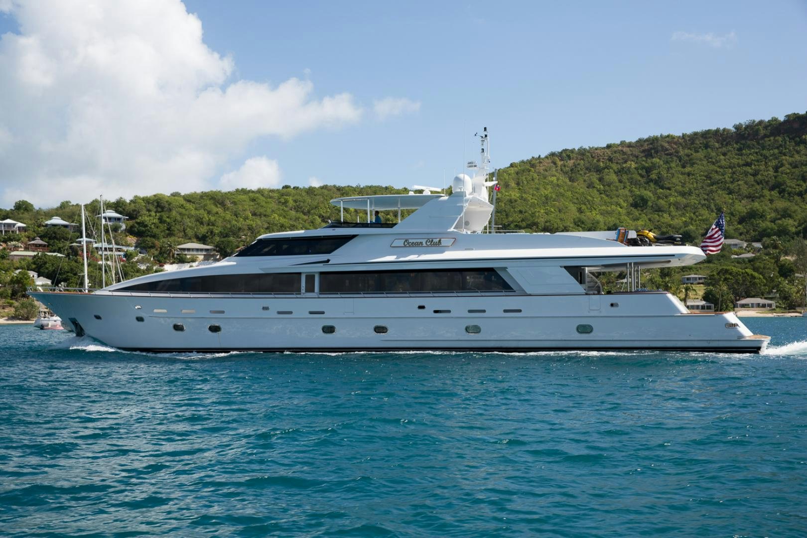 a large white yacht aboard OCEAN CLUB Yacht for Sale