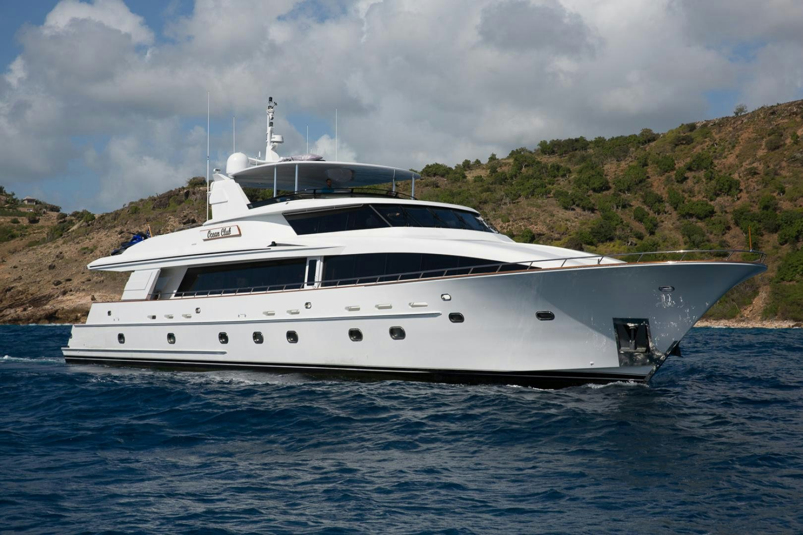 a white yacht on the water aboard OCEAN CLUB Yacht for Sale