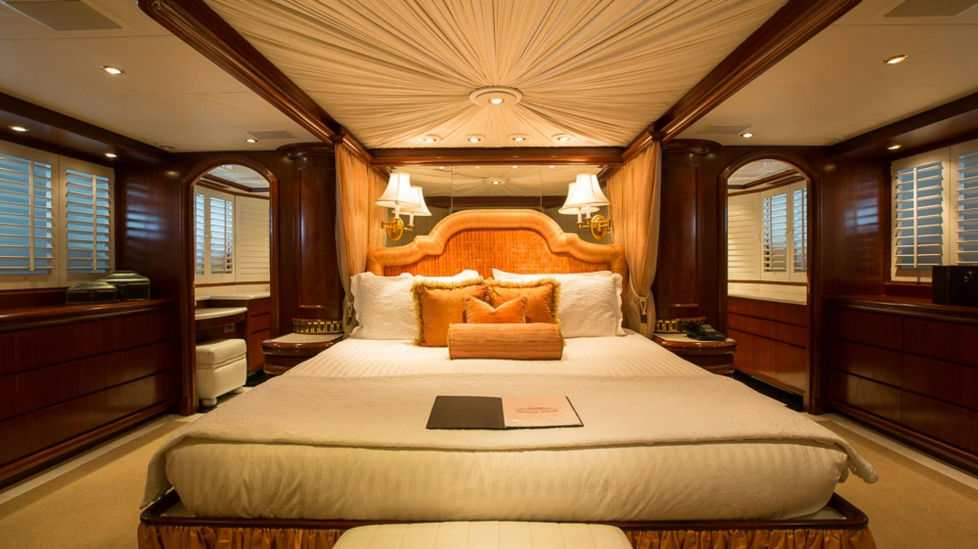 a bed in a room aboard OCEAN CLUB Yacht for Sale