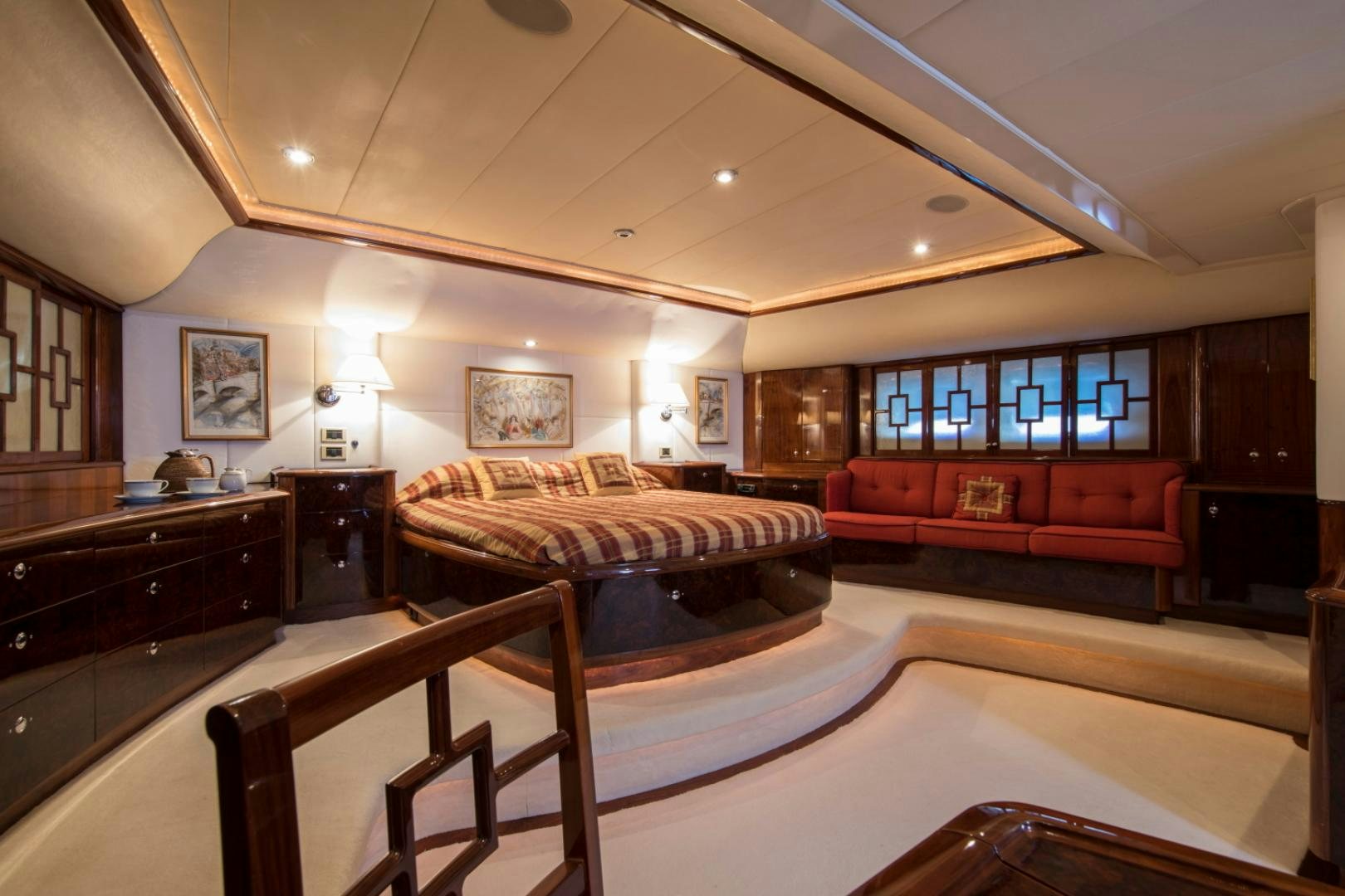 a large bedroom with a large bed aboard SOVEREIGN Yacht for Sale