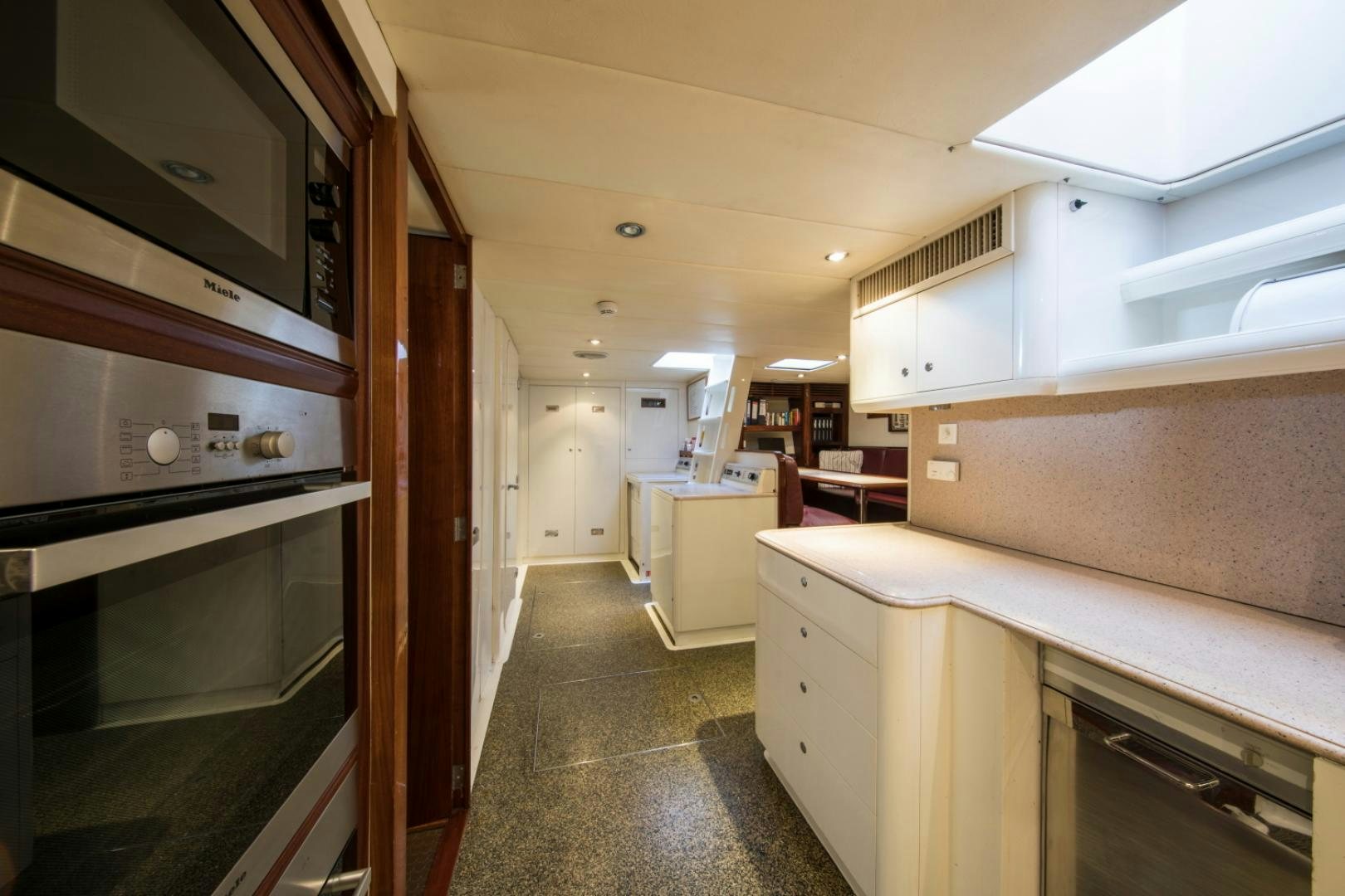 a kitchen with a large oven aboard SOVEREIGN Yacht for Sale