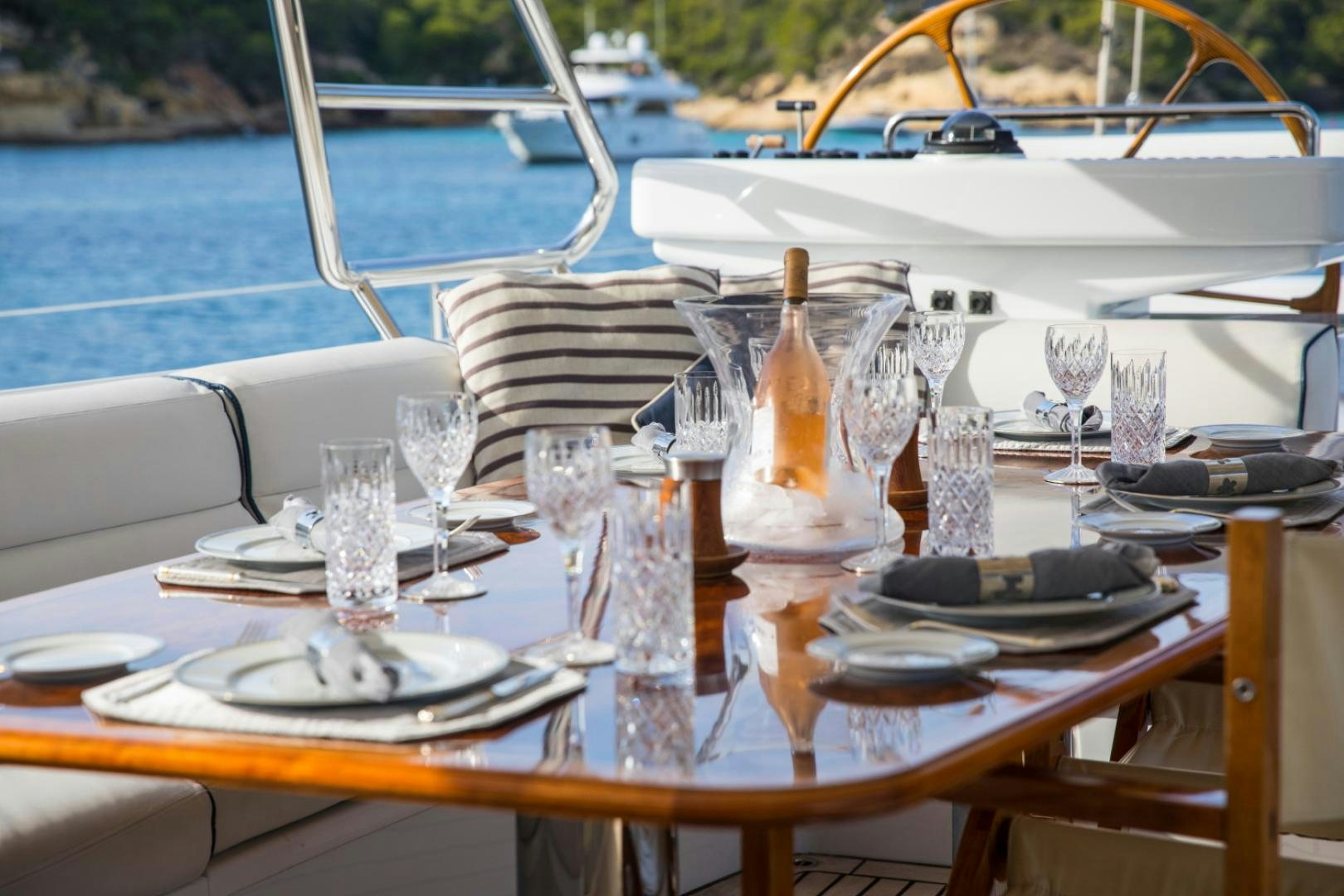 a table set for a dinner aboard SOVEREIGN Yacht for Sale