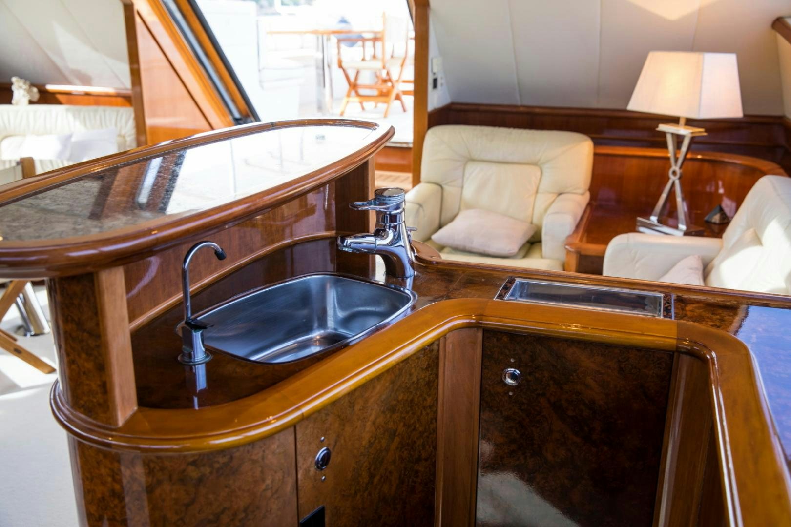 a bathroom with a sink and a bathtub aboard SOVEREIGN Yacht for Sale