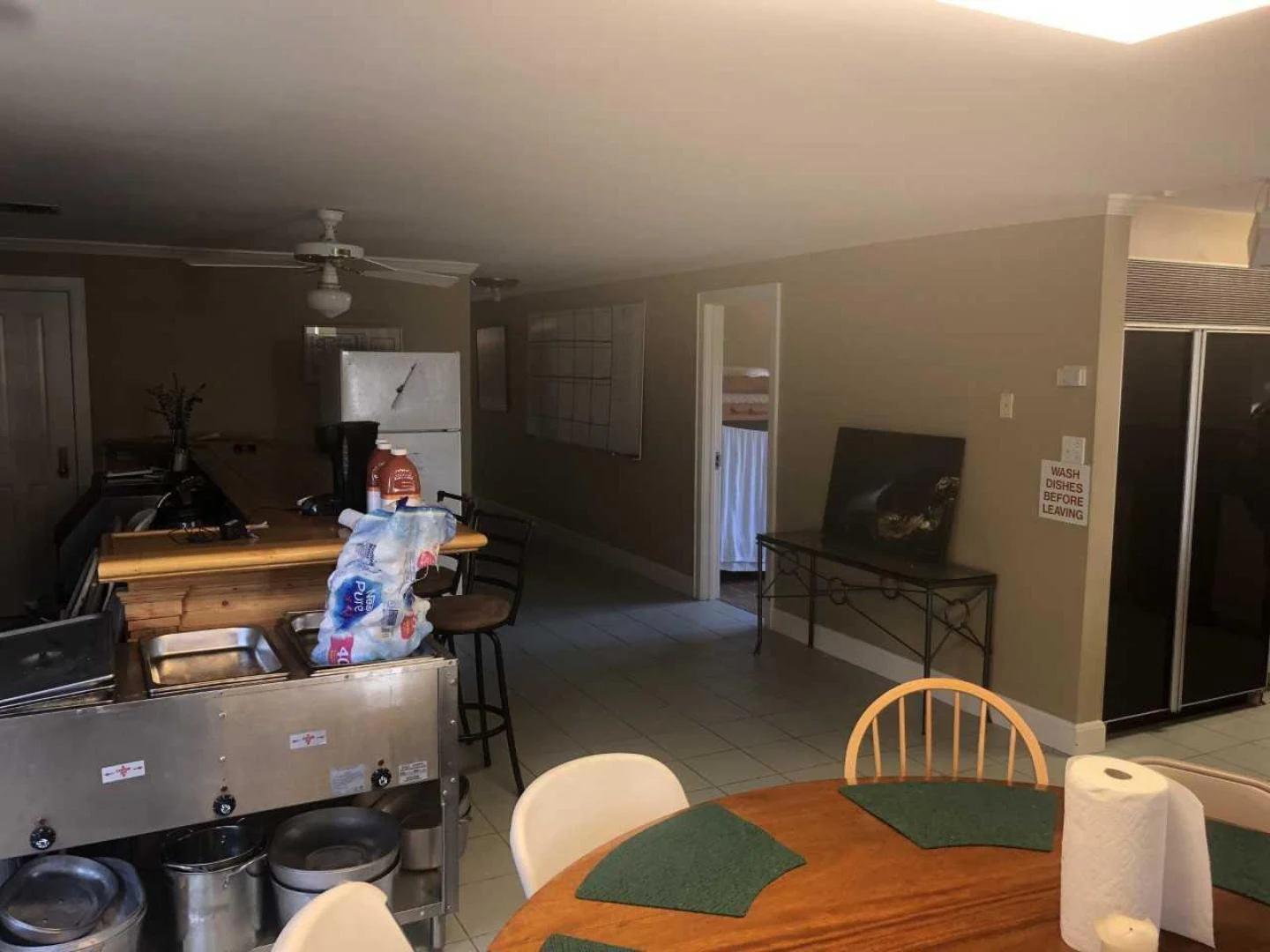 a person in a kitchen aboard LAKEHOUSE Yacht for Sale
