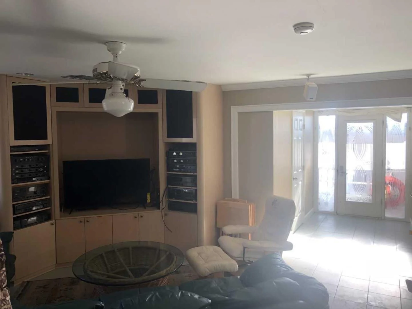 a living room with a fireplace aboard LAKEHOUSE Yacht for Sale