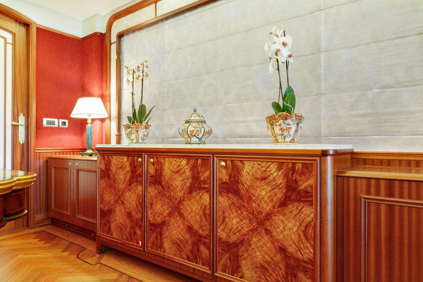 a room with a cabinet and a vase with flowers on it aboard NO NAME Yacht for Sale