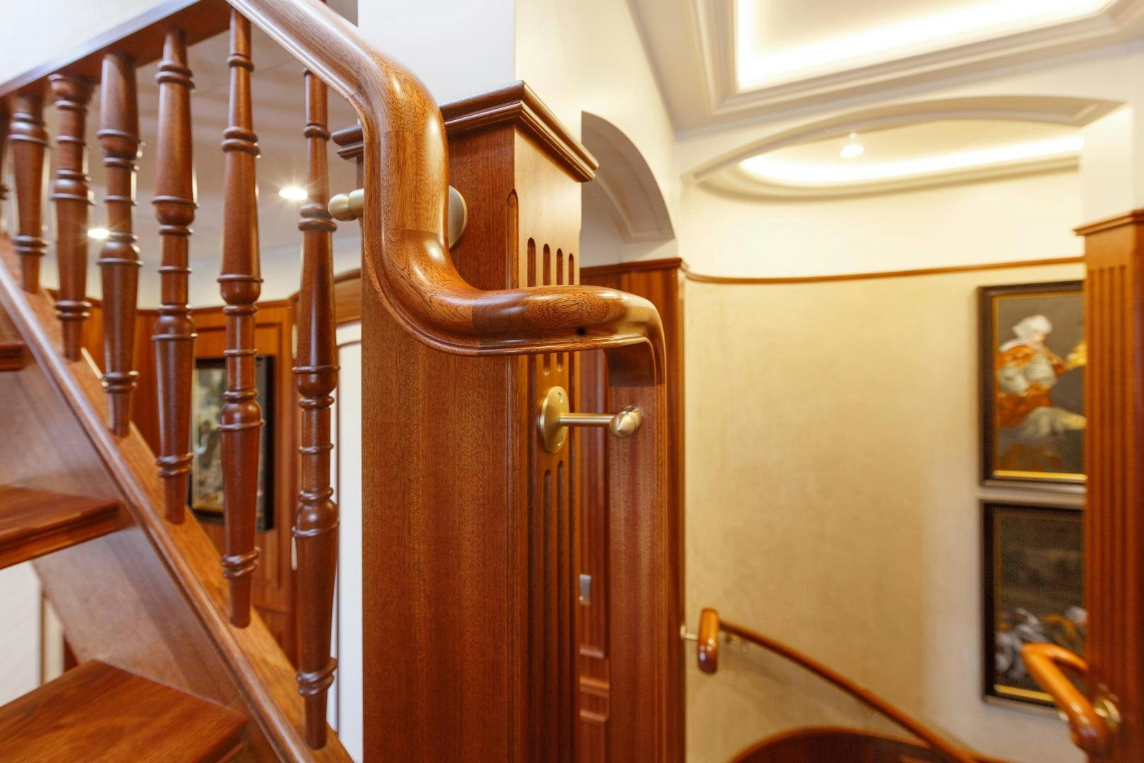 a wooden staircase with a wood railing aboard NO NAME Yacht for Sale
