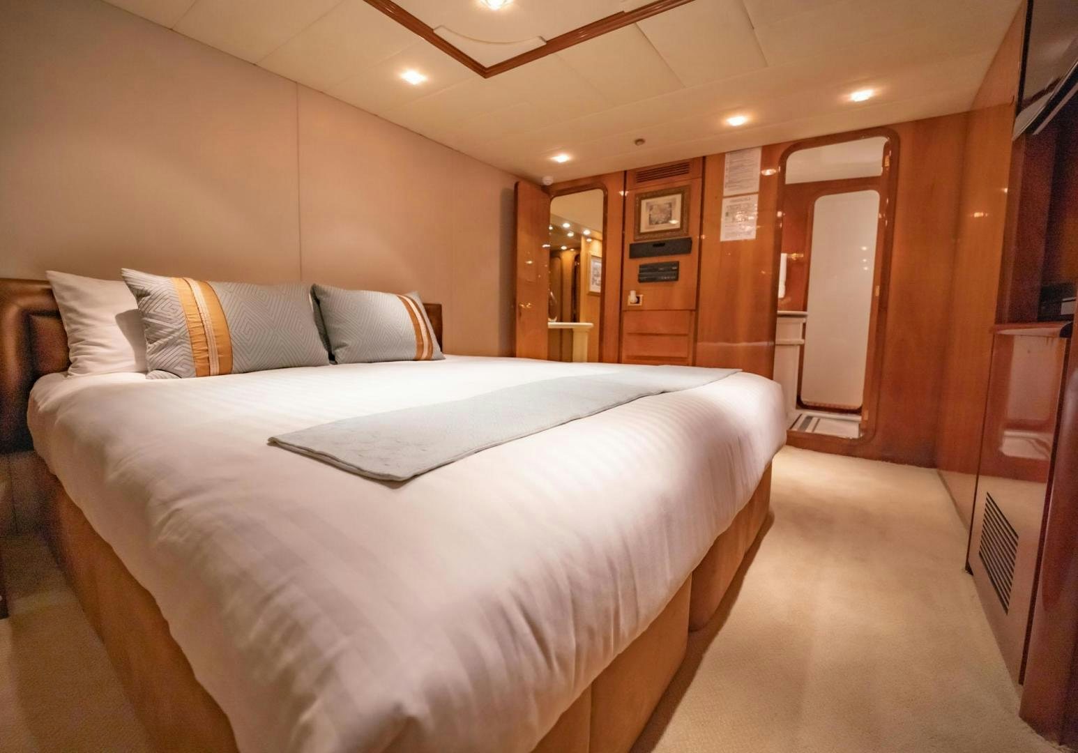 a bed in a room aboard SHALIMAR Yacht for Sale