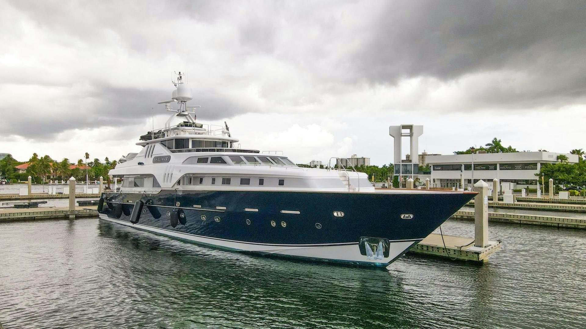 a large boat on the water aboard SHALIMAR Yacht for Sale