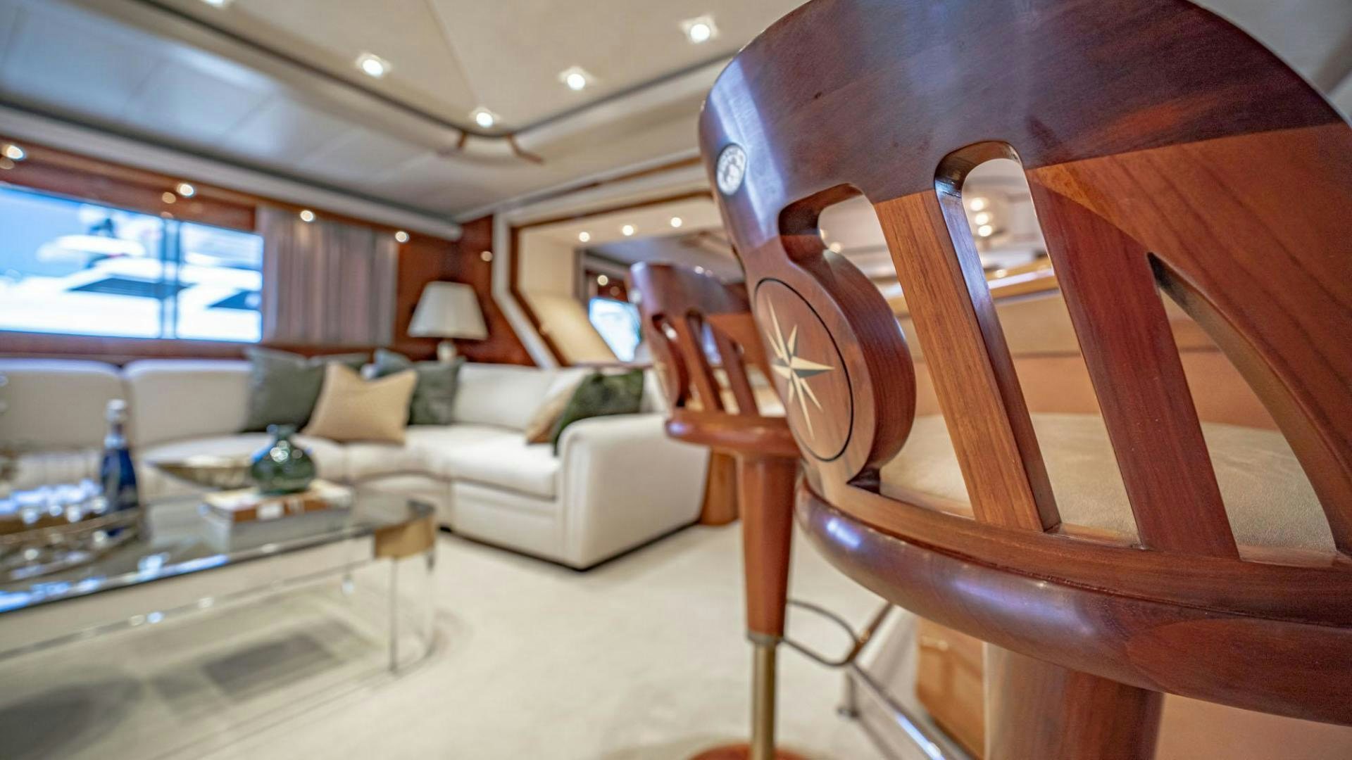 a room with a couch and a chair aboard SHALIMAR Yacht for Sale