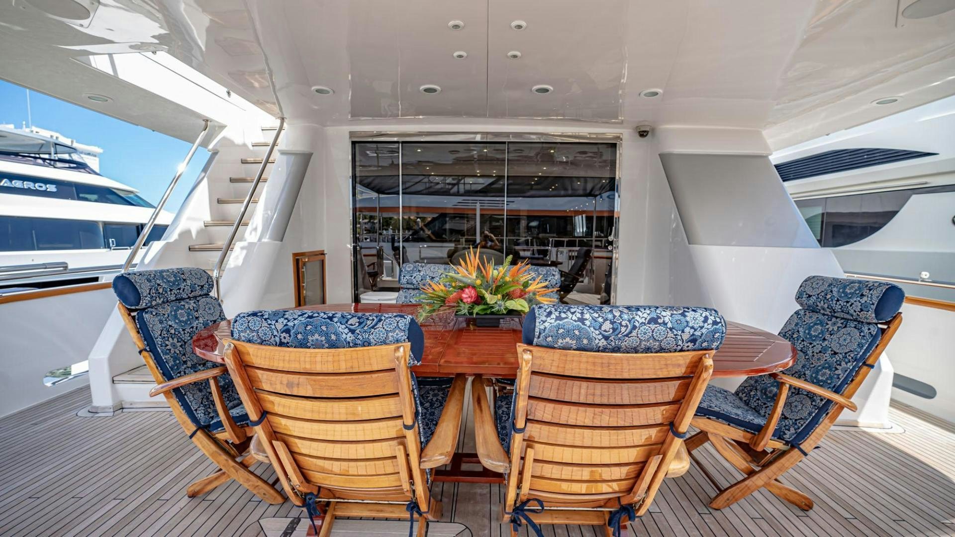 a room with chairs and tables aboard SHALIMAR Yacht for Sale