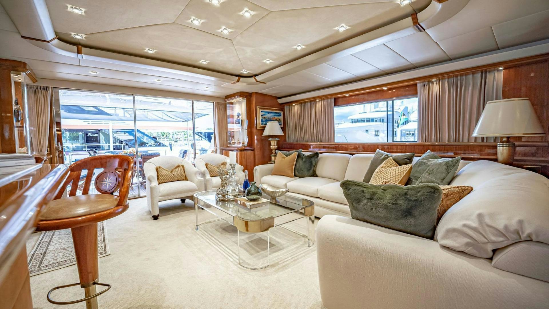 a living room with a couch and a table aboard SHALIMAR Yacht for Sale