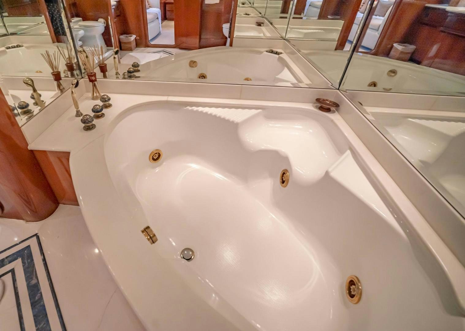 a white sink with a faucet aboard SHALIMAR Yacht for Sale