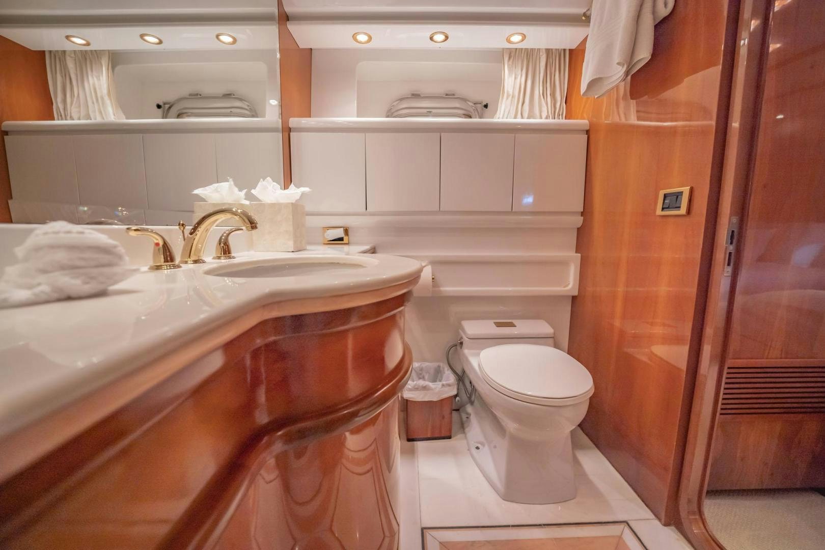 a bathroom with a sink and toilet aboard SHALIMAR Yacht for Sale