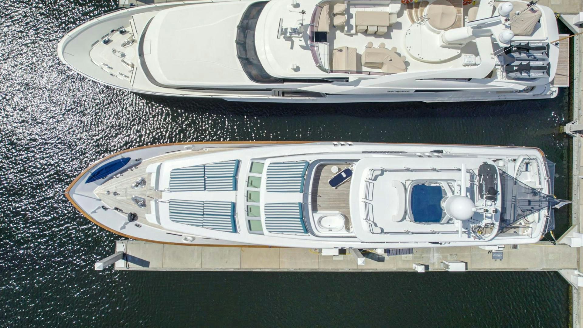 a silver car with a blue logo aboard SHALIMAR Yacht for Sale