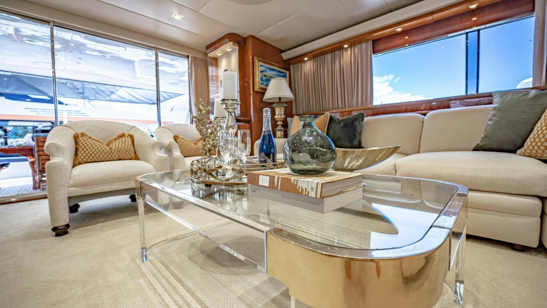 a living room with a large window aboard SHALIMAR Yacht for Sale