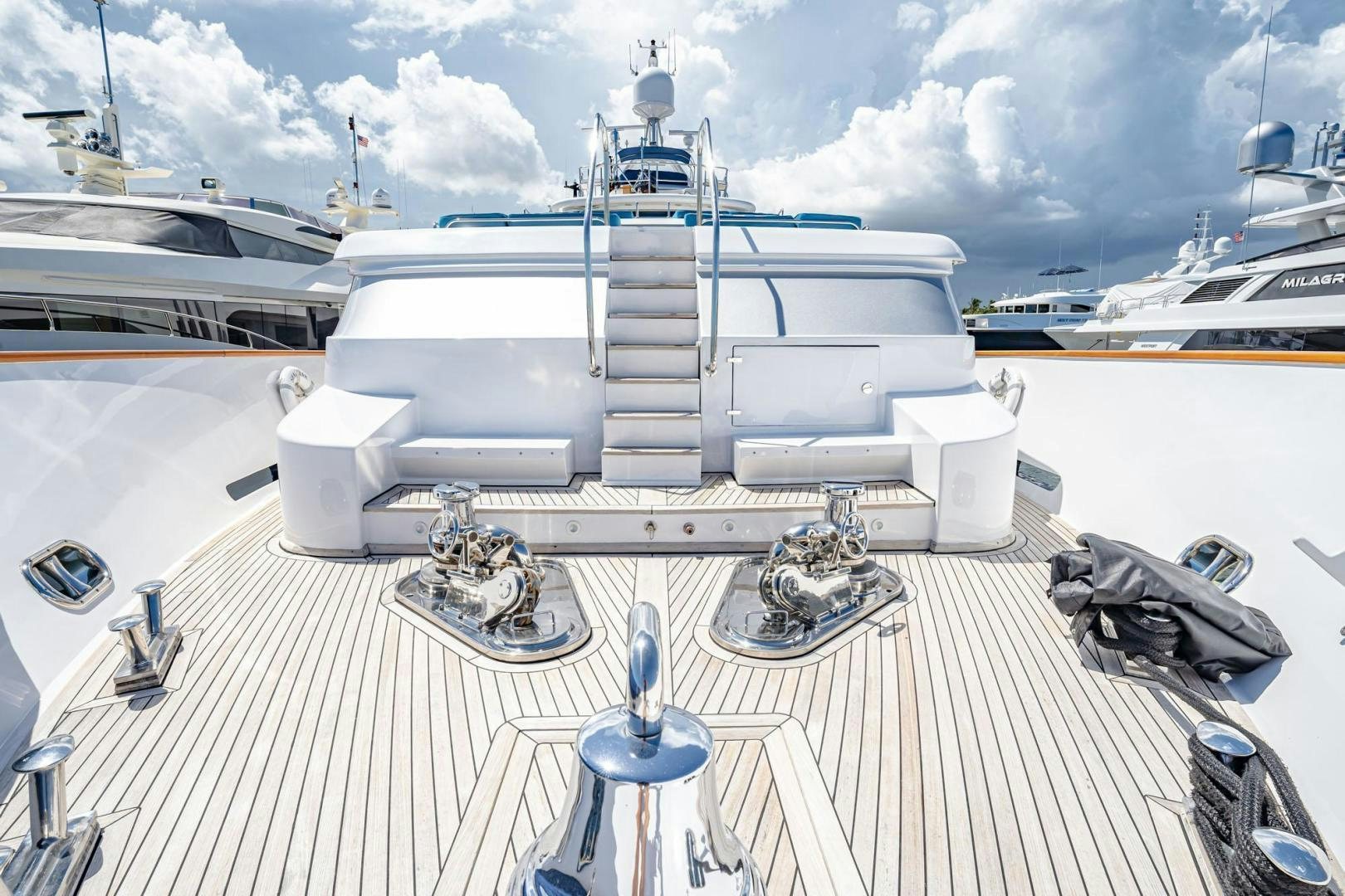a deck with a deck and a large ship on it aboard SHALIMAR Yacht for Sale