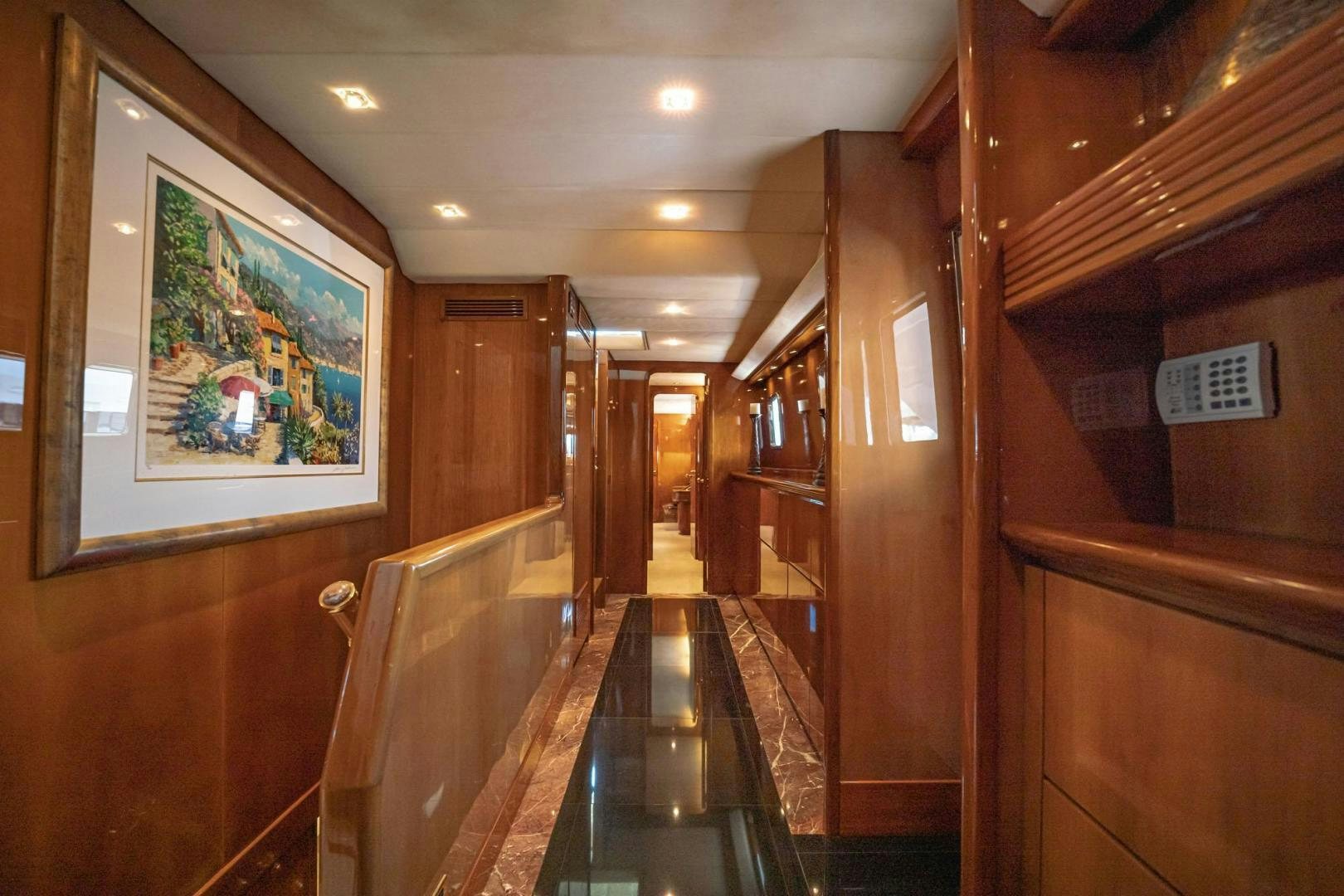 a hallway with wood doors aboard SHALIMAR Yacht for Sale