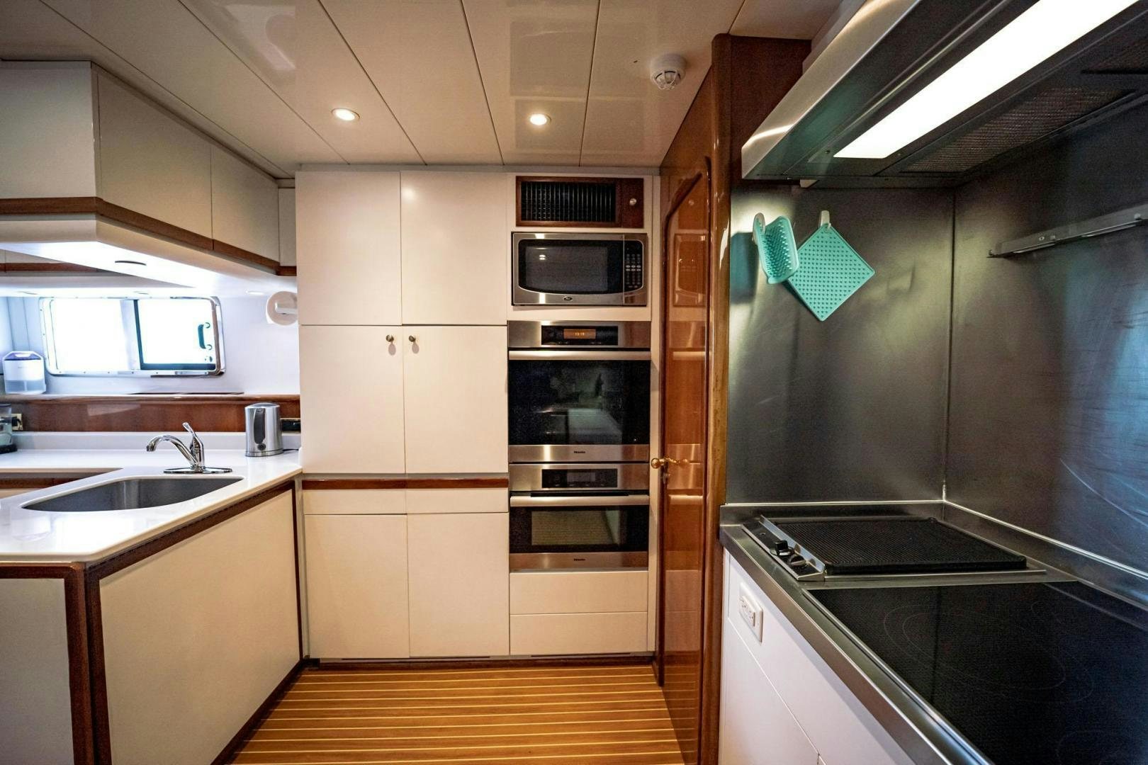 a kitchen with a stove and oven aboard SHALIMAR Yacht for Sale